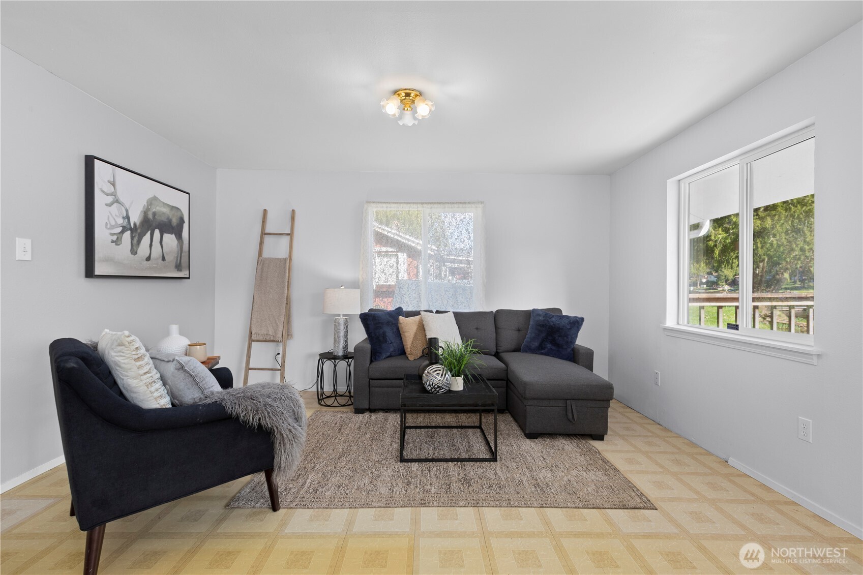 39201 Orville Road East Eatonville, WA 98328 - Photo 13 of 30 a living room with furniture and a window