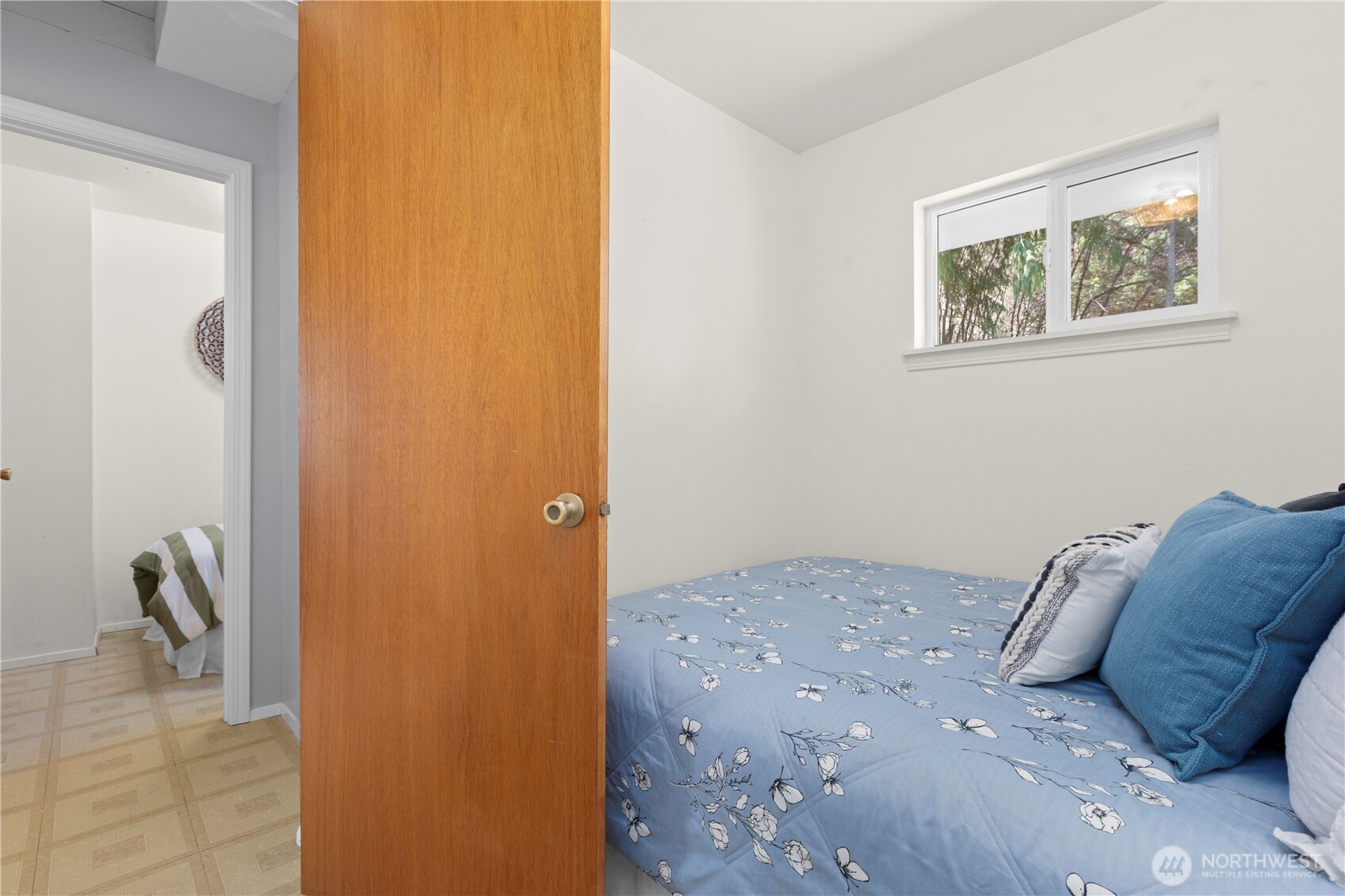 39201 Orville Road East Eatonville, WA 98328 - Photo 17 of 30 a bedroom with a bed and a window