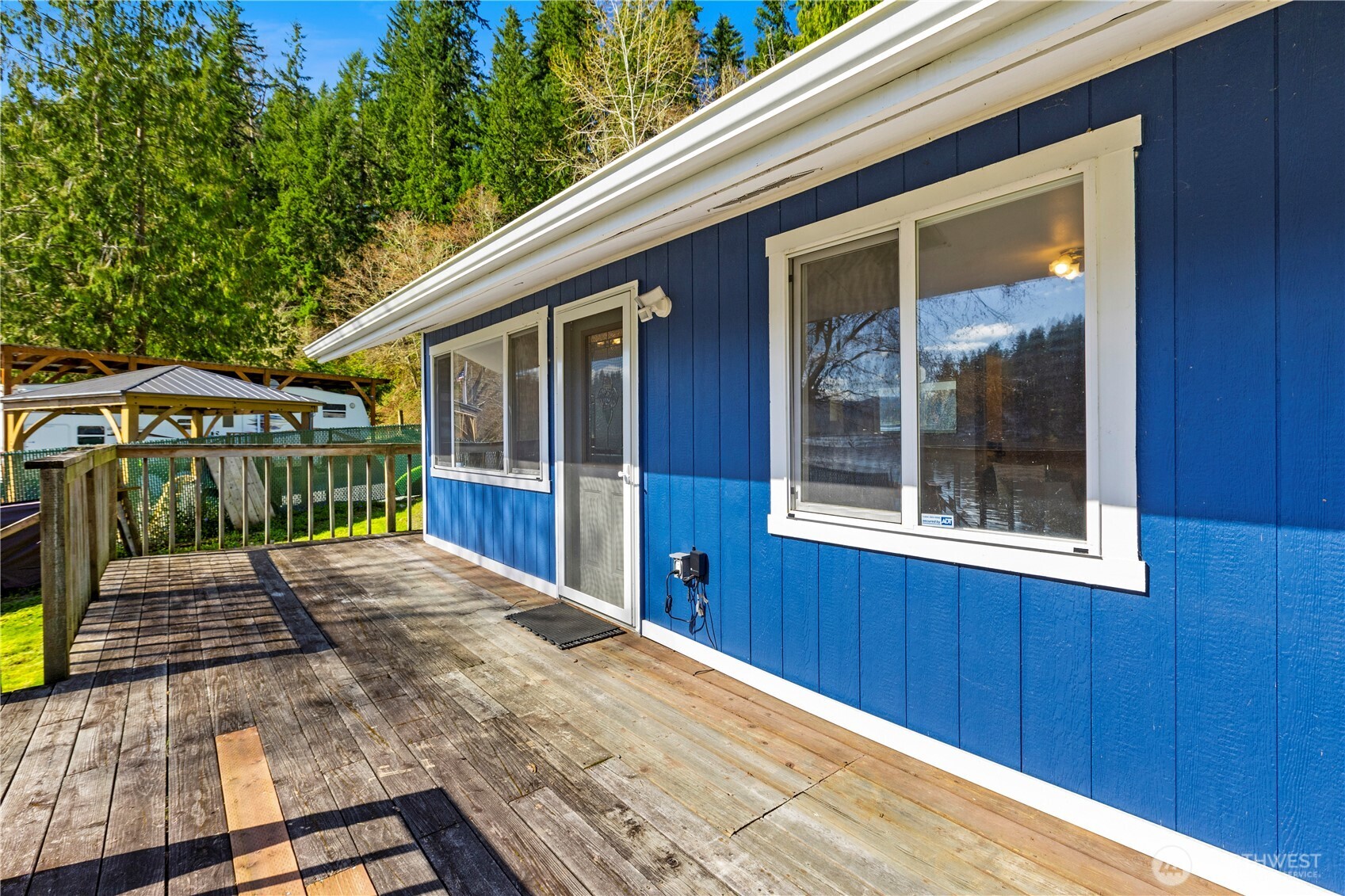 39201 Orville Road East Eatonville, WA 98328 - Photo 21 of 30 a view of a house with a balcony