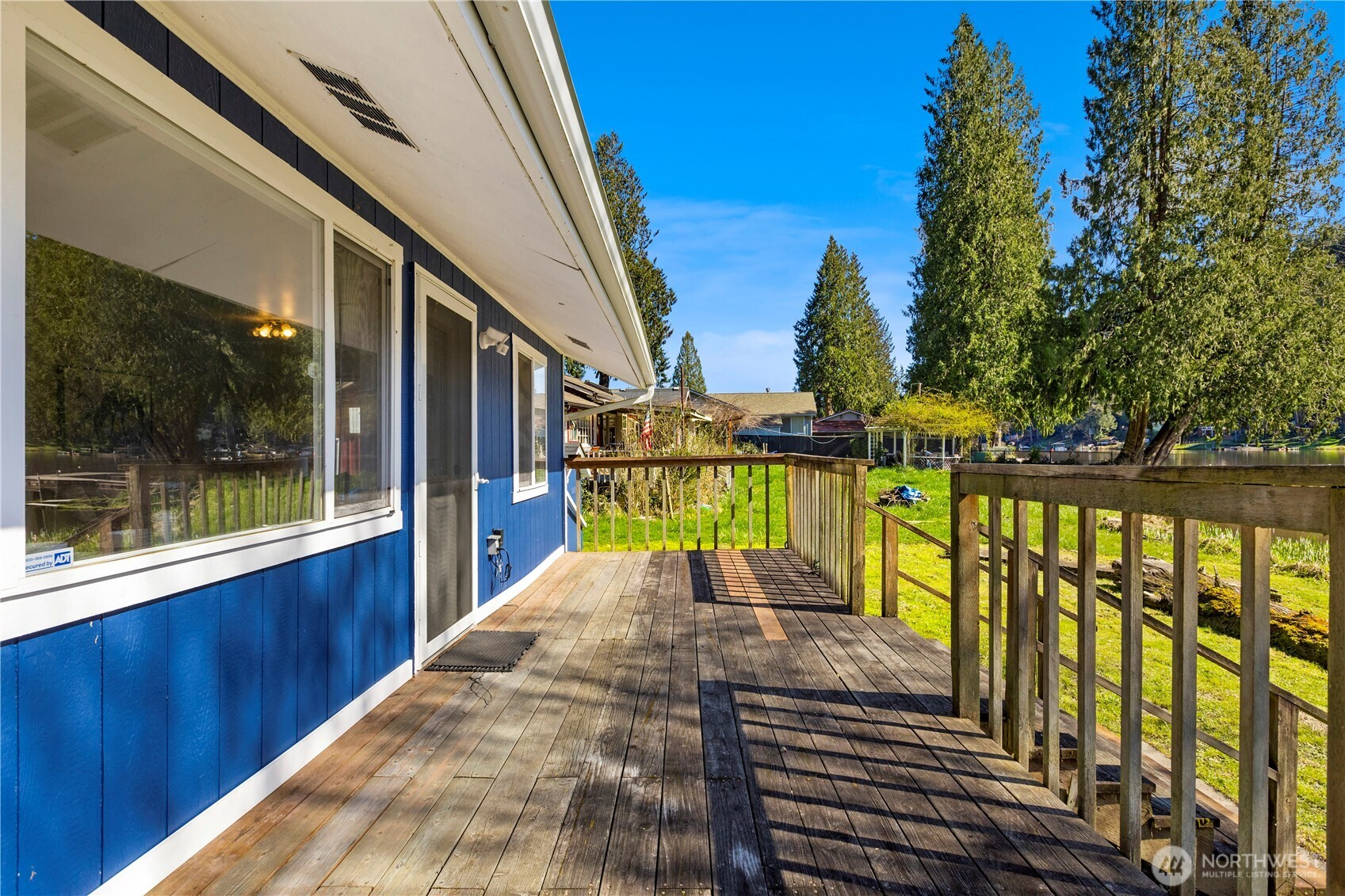 39201 Orville Road East Eatonville, WA 98328 - Photo 23 of 30 a view of a balcony with a floor to ceiling window and tree