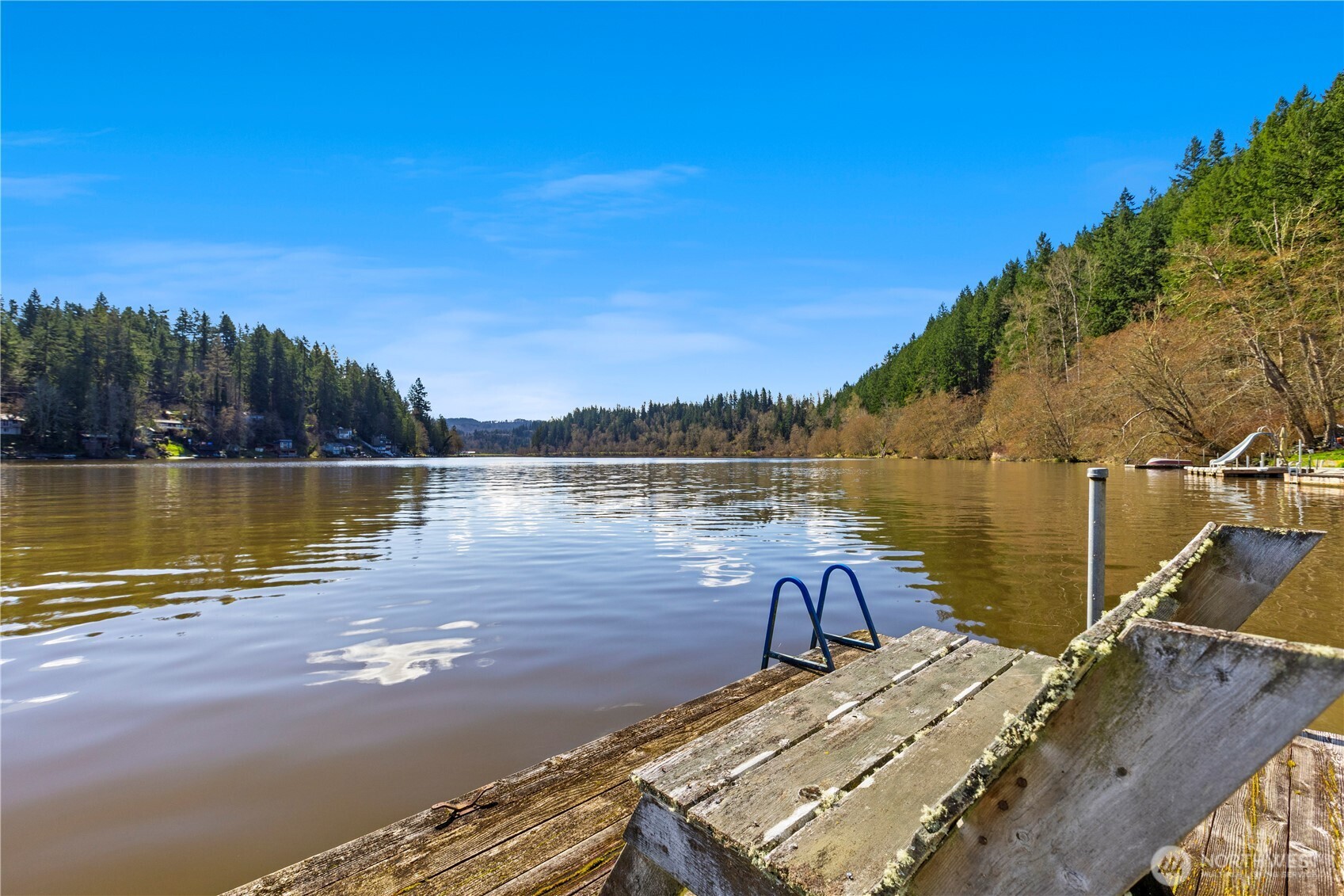 39201 Orville Road East Eatonville, WA 98328 - Photo 27 of 30 a view of a lake with houses