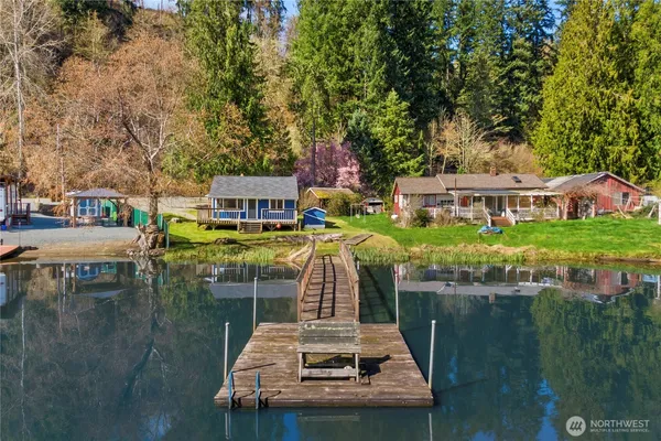 a swimming pool view with a lake view