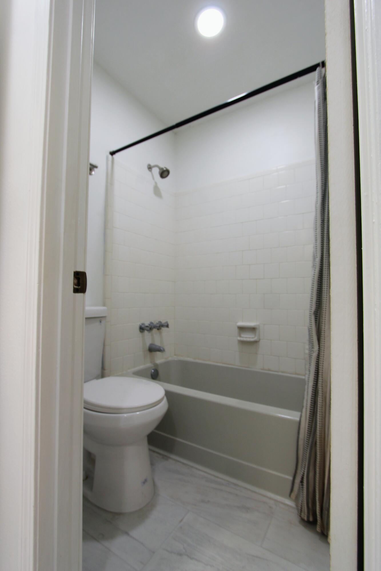 8250 Kause Road Pensacola, FL 32506 - Photo 17 of 28 a bathroom with a shower and a toilet