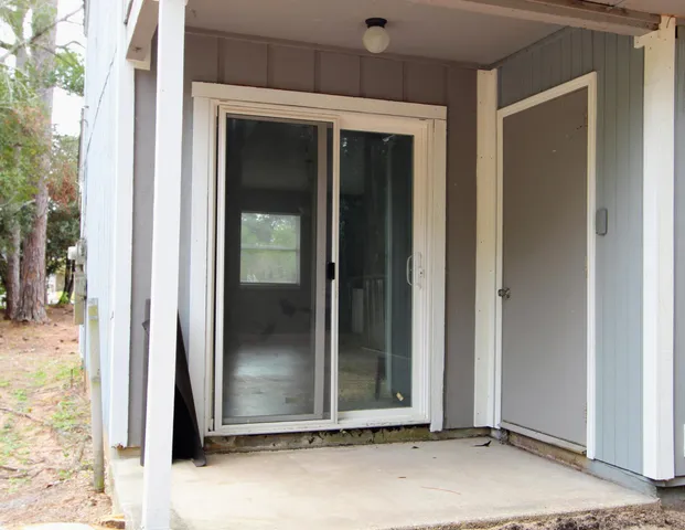 a view of a room that has a door