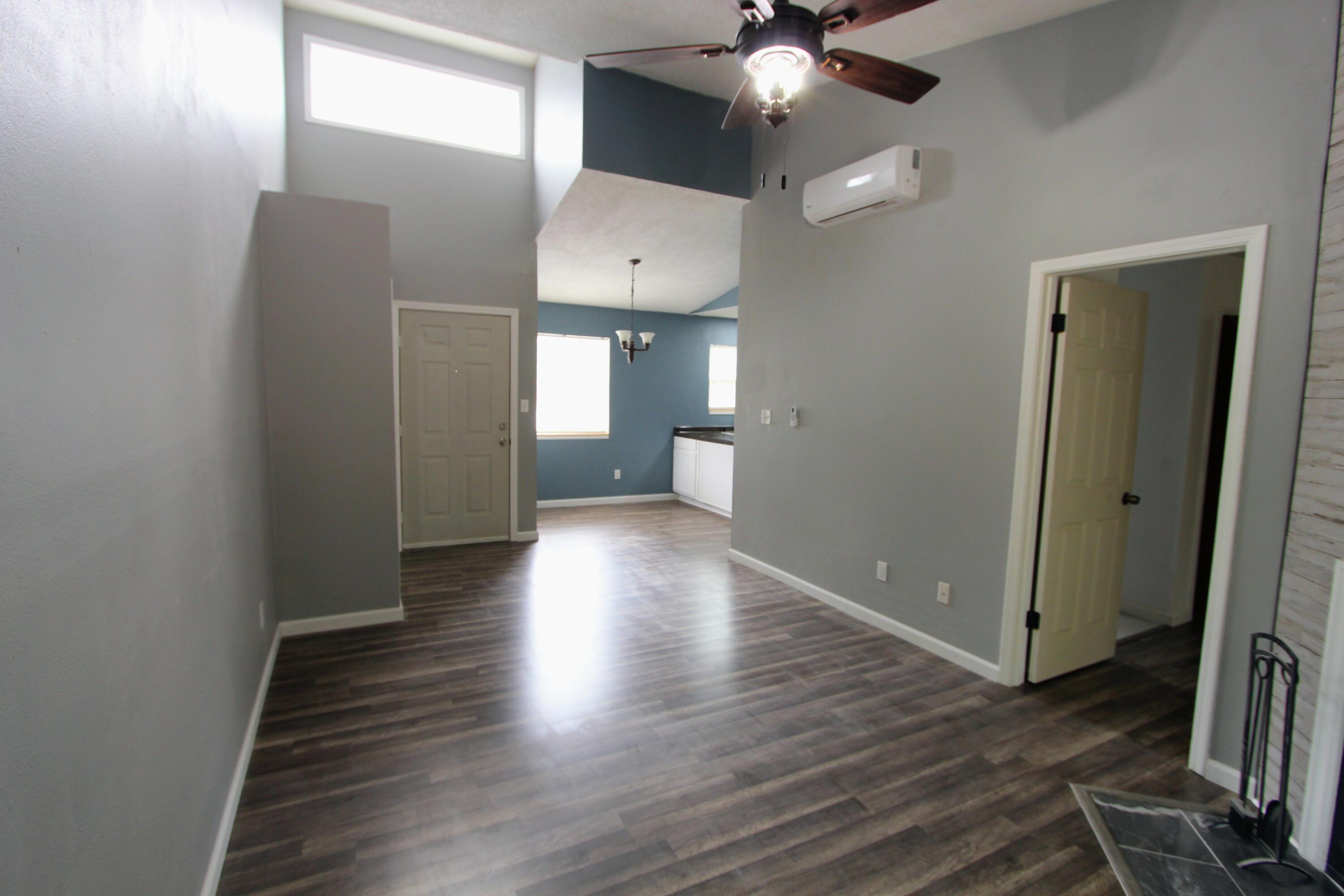 8250 Kause Road Pensacola, FL 32506 - Photo 5 of 28 a view of a hallway with wooden floor