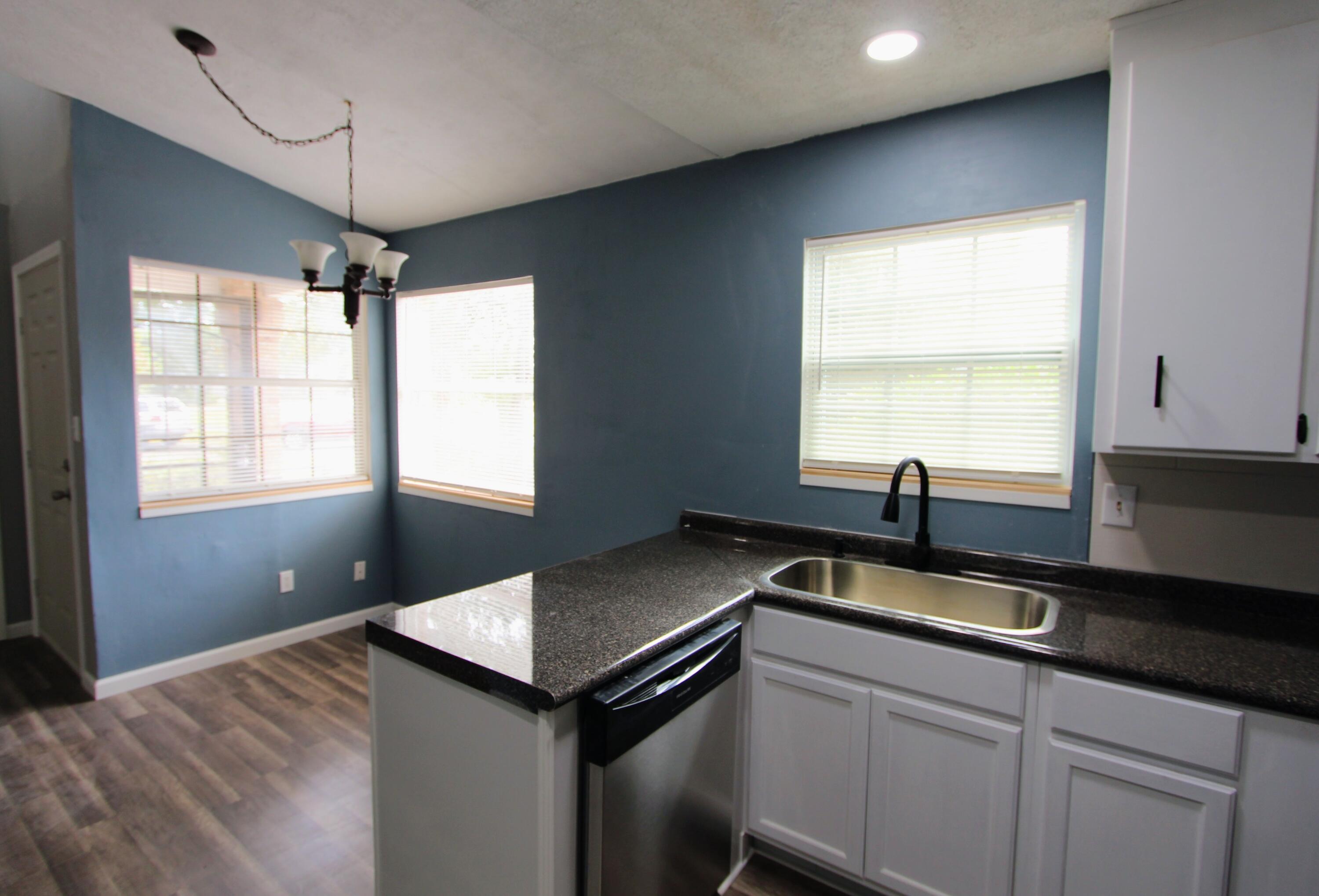 8250 Kause Road Pensacola, FL 32506 - Photo 9 of 28 a kitchen with a sink and window