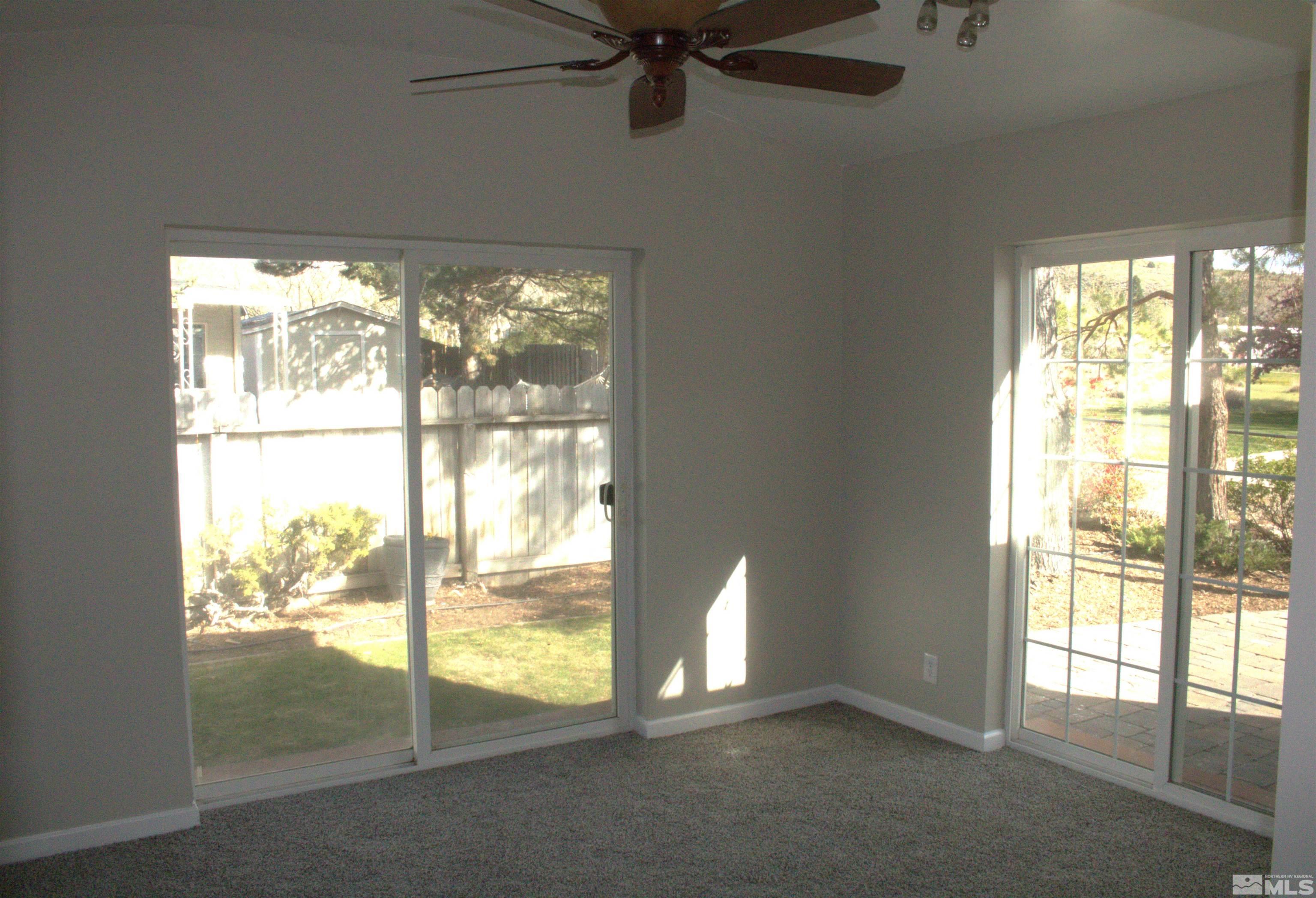 16190 Rhyolite Circle Reno, NV 89521 - Photo 15 of 28 a view of an empty room and window