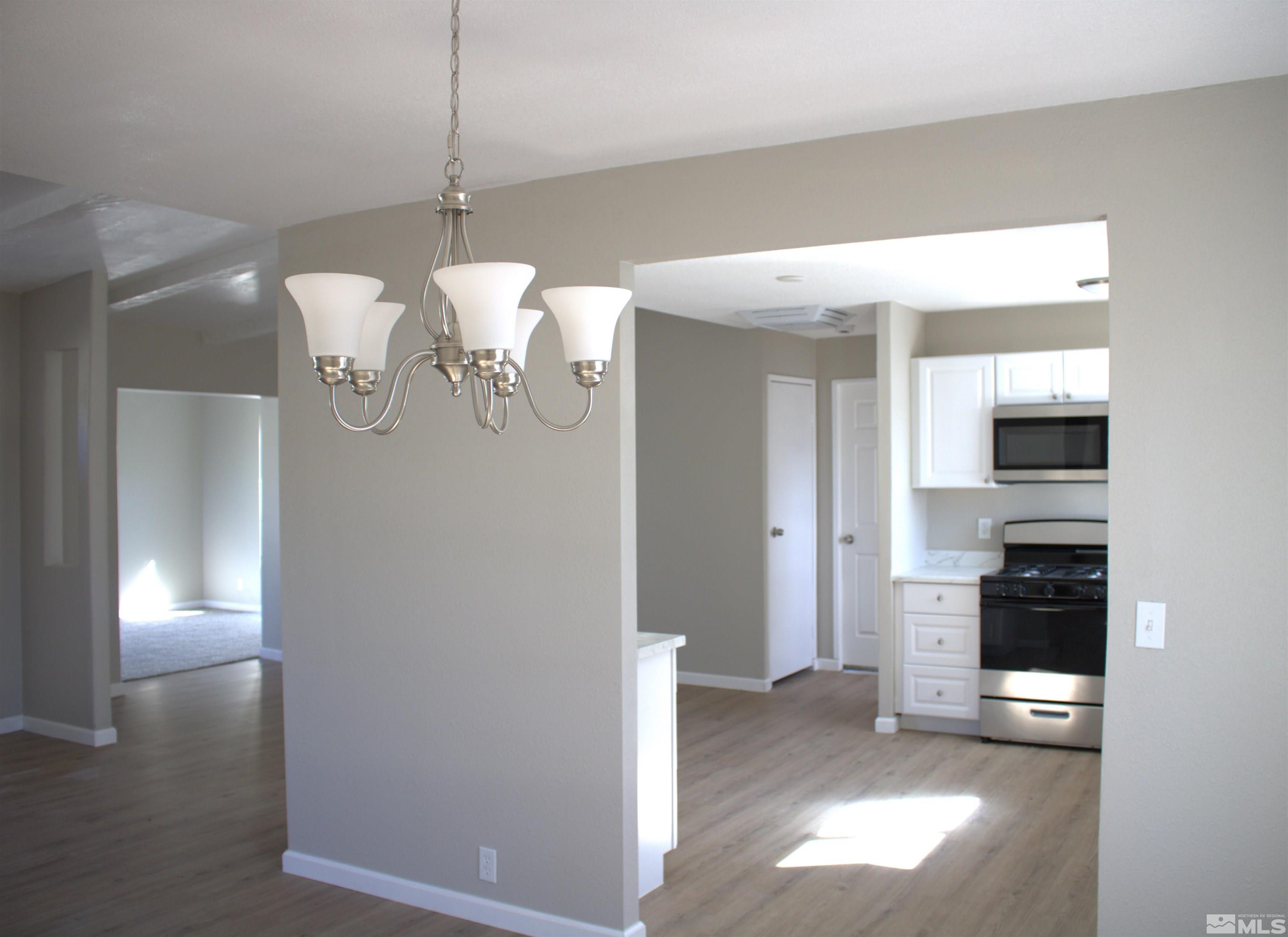 16190 Rhyolite Circle Reno, NV 89521 - Photo 7 of 28 a view of a kitchen with a sink