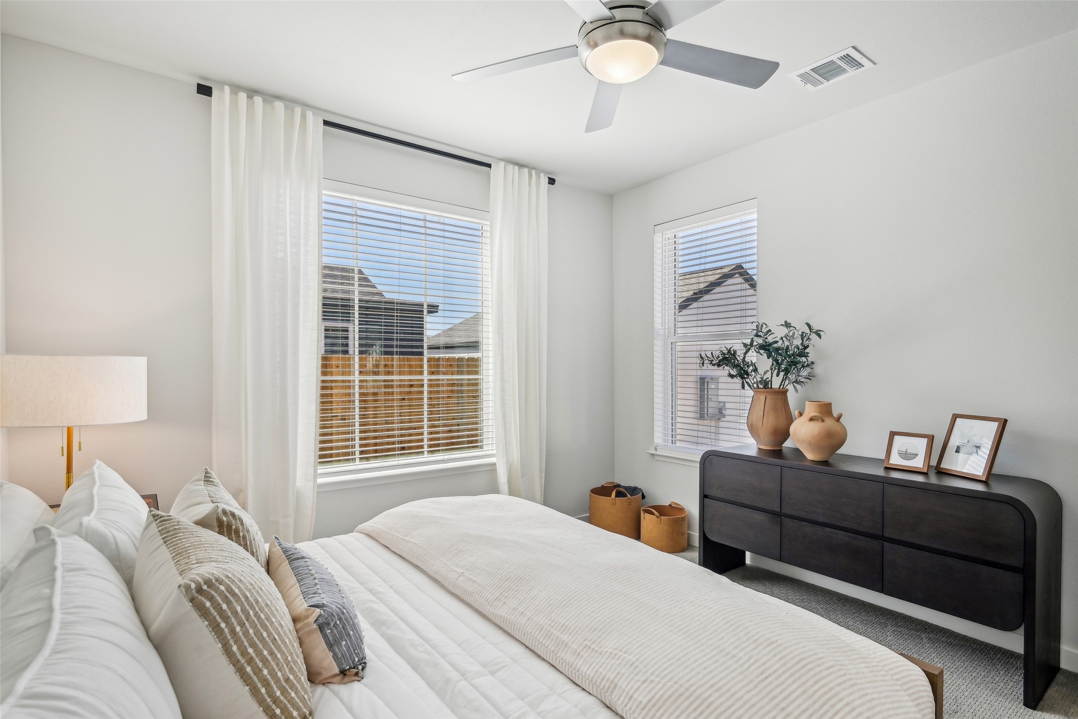 3651-313 South Custer Road McKinney, TX 75070 - Photo 19 of 28 a bedroom with a bed and window