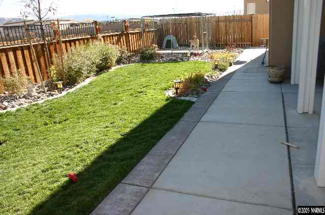 10580 Twin Bridges Way Reno, NV 89521 - Photo 9 of 9 a view of a backyard with sitting area