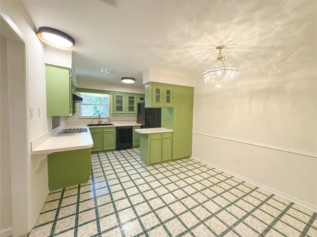 a room with a table and chairs