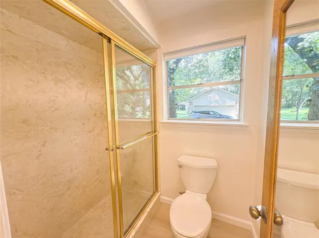 a bathroom with a toilet