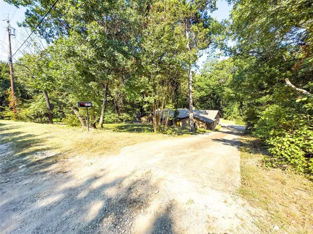 a view of swimming pool with patio
