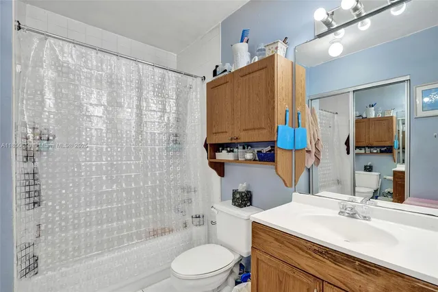 a view of a city with tall buildings