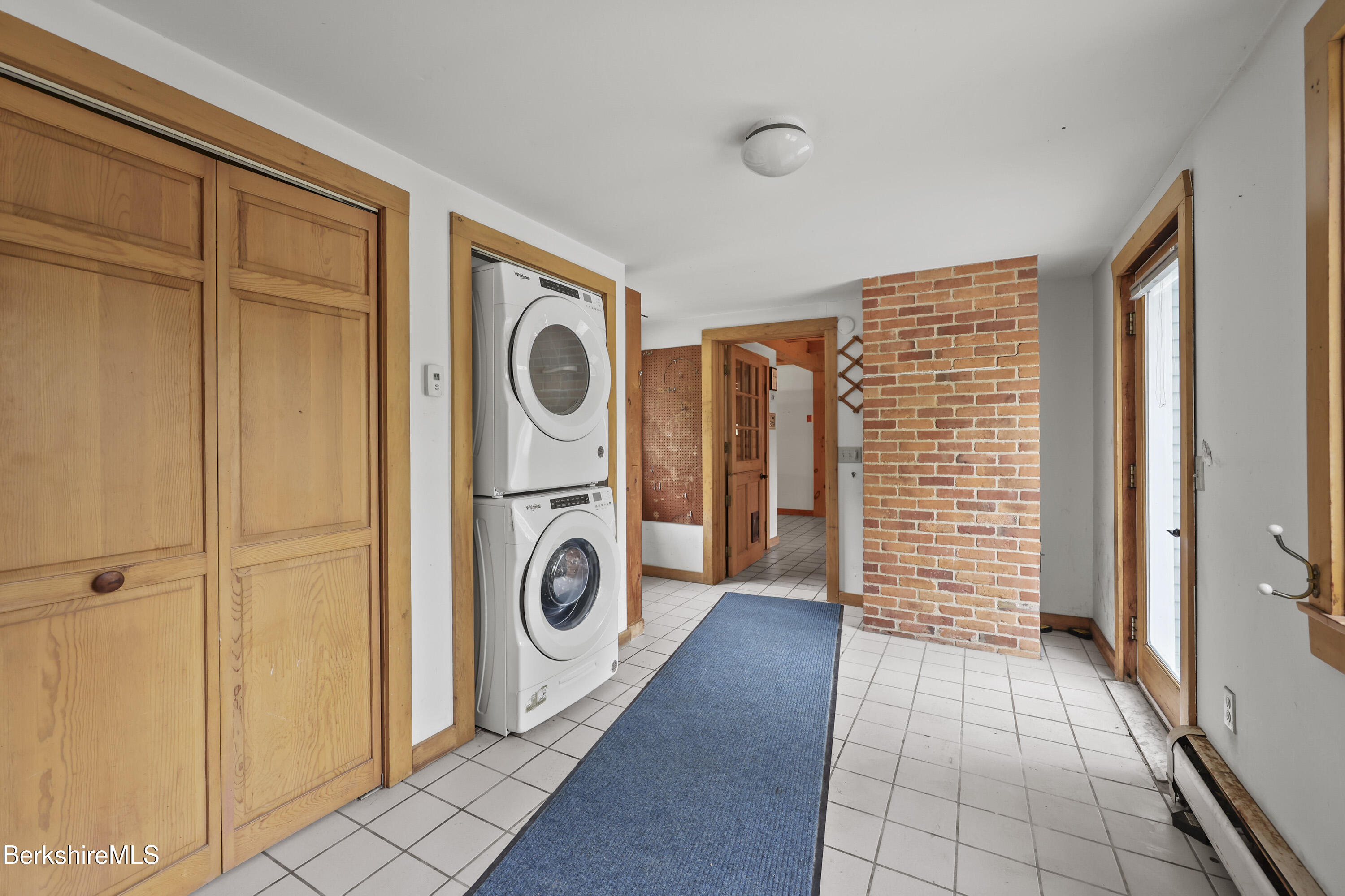 1030 Simonds Road Williamstown, MA 01267 - Photo 56 of 76 a view of a hallway with washer and dryer