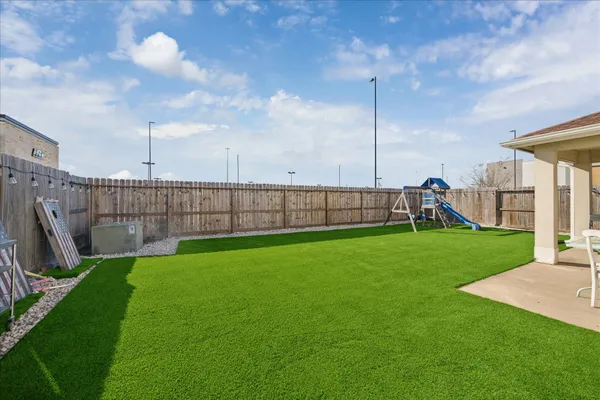 a view of a garden with a slide