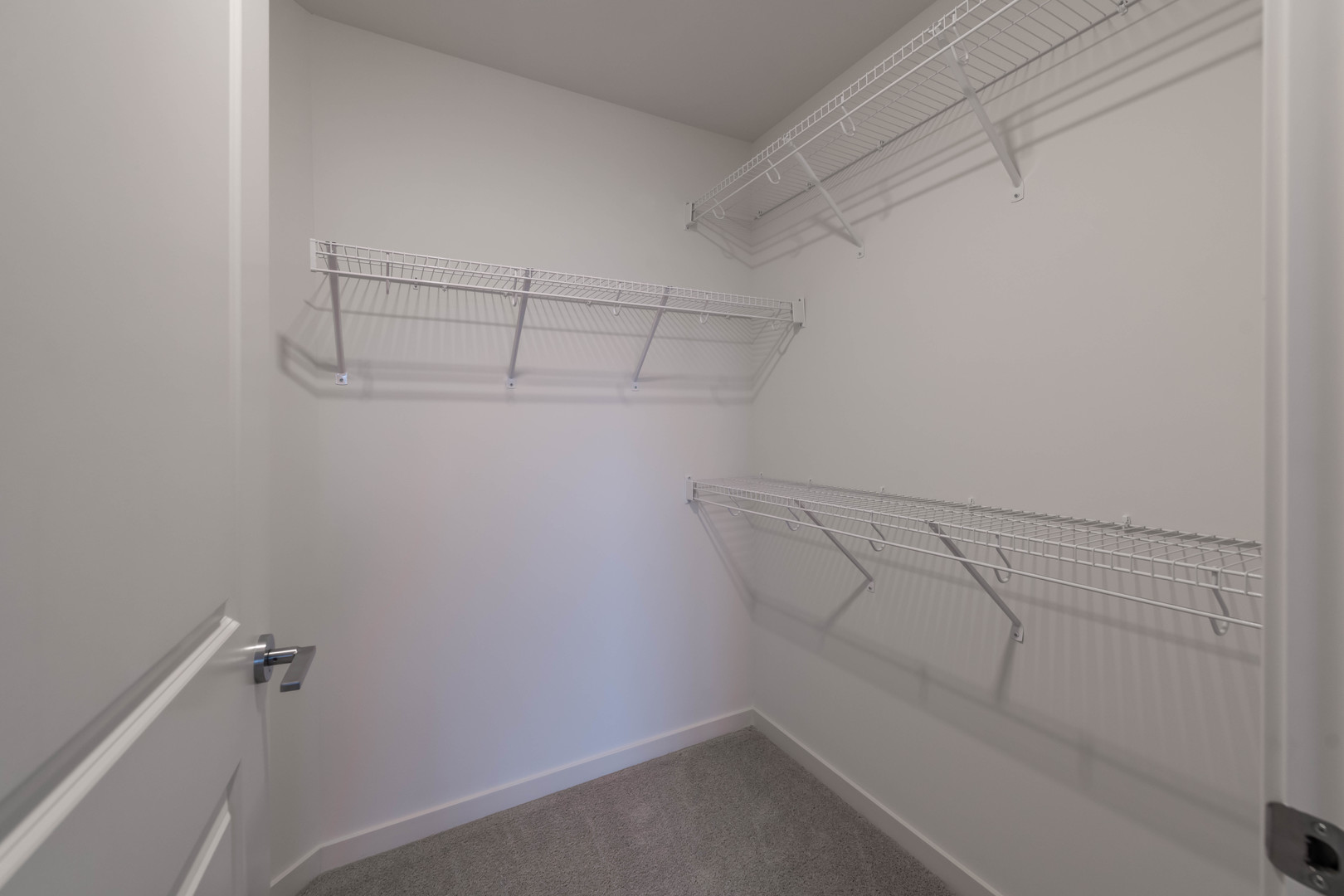 21599 West Field Court, Unit 1213 Deer Park, IL 60010 - Photo 6 of 14 a view of a room with racks on the wall