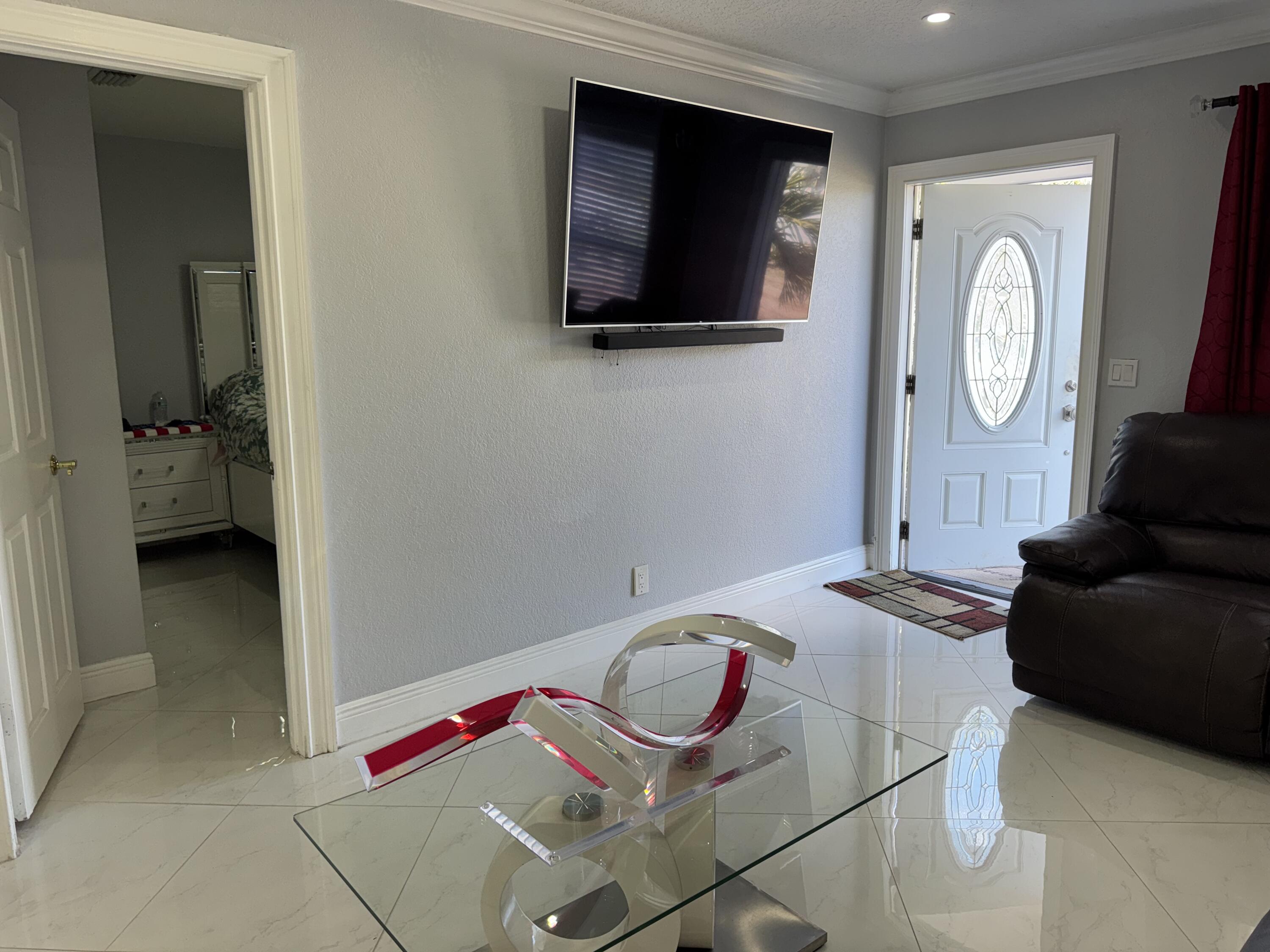 5792 Orange Road Royal Palm Estates, FL 33413 - Photo 2 of 28 IMG_7330