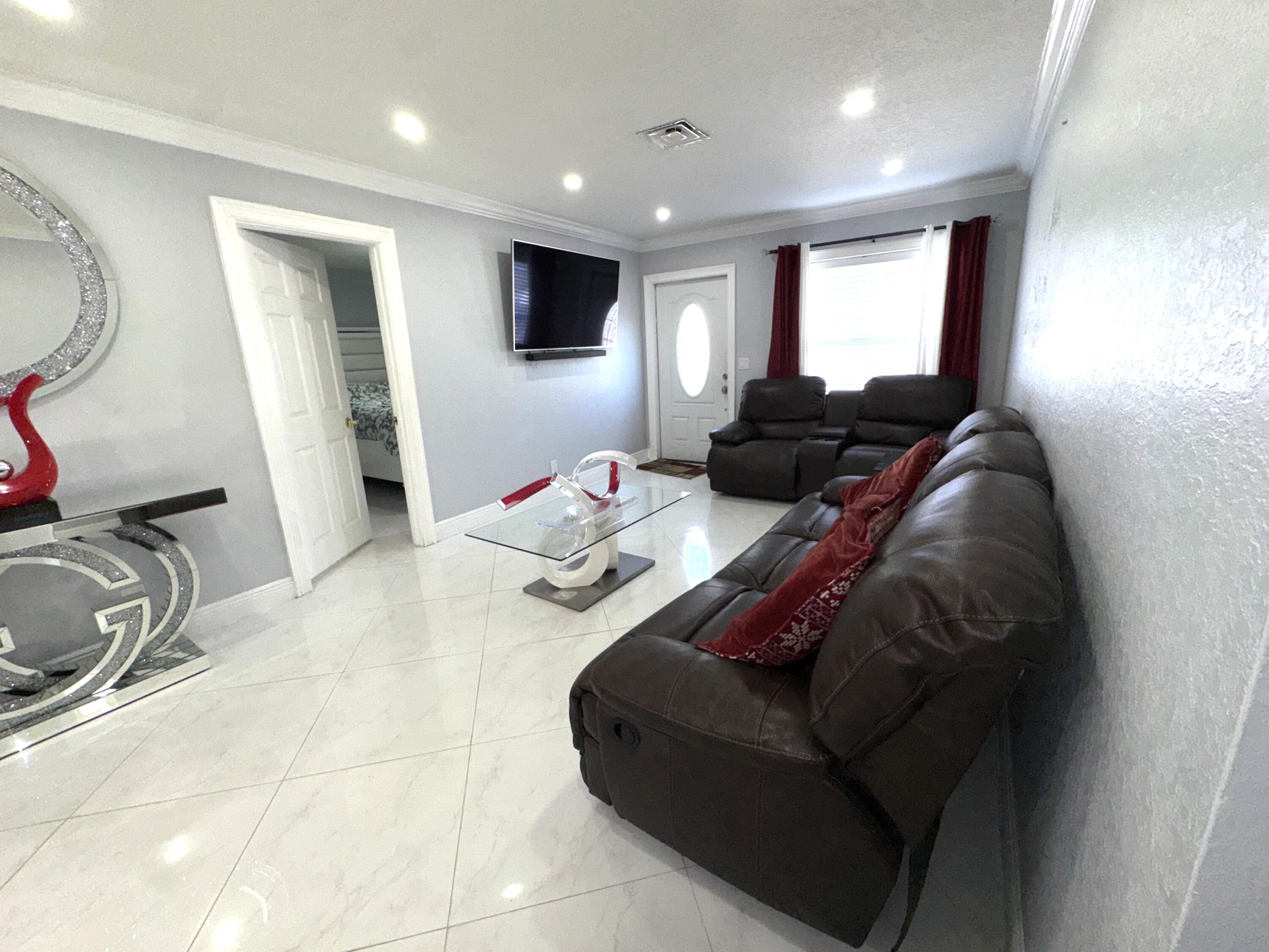 5792 Orange Road Royal Palm Estates, FL 33413 - Photo 4 of 28 IMG_7312