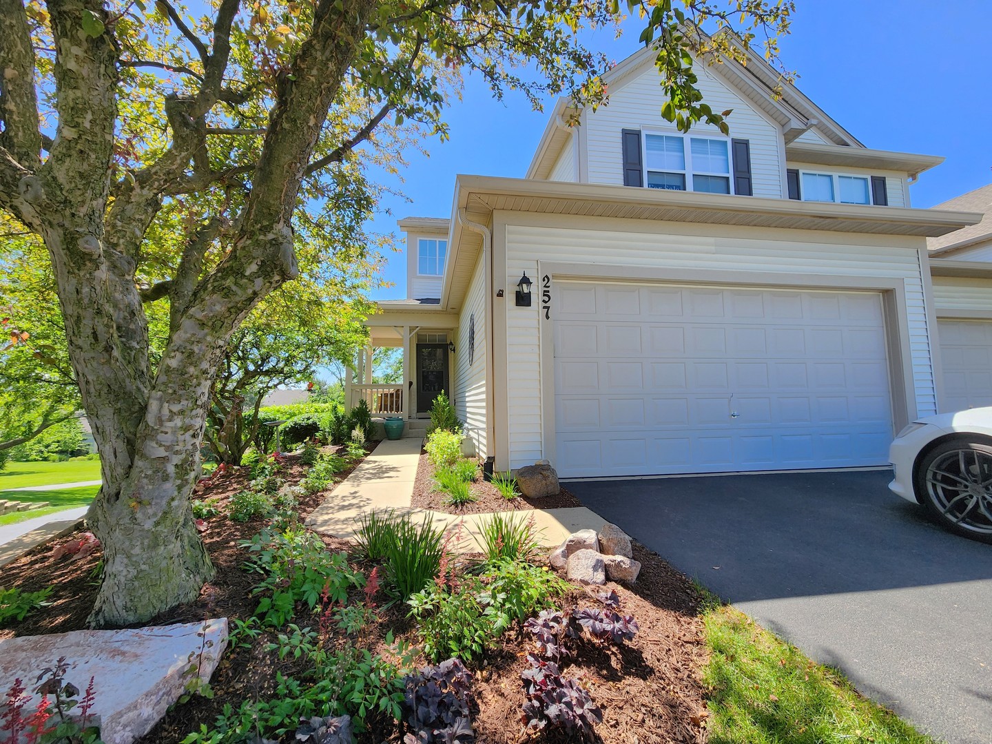 257 Grand Ridge Road, Unit 257 St. Charles, IL 60175 - Photo 1 of 65 a house view with a outdoor space