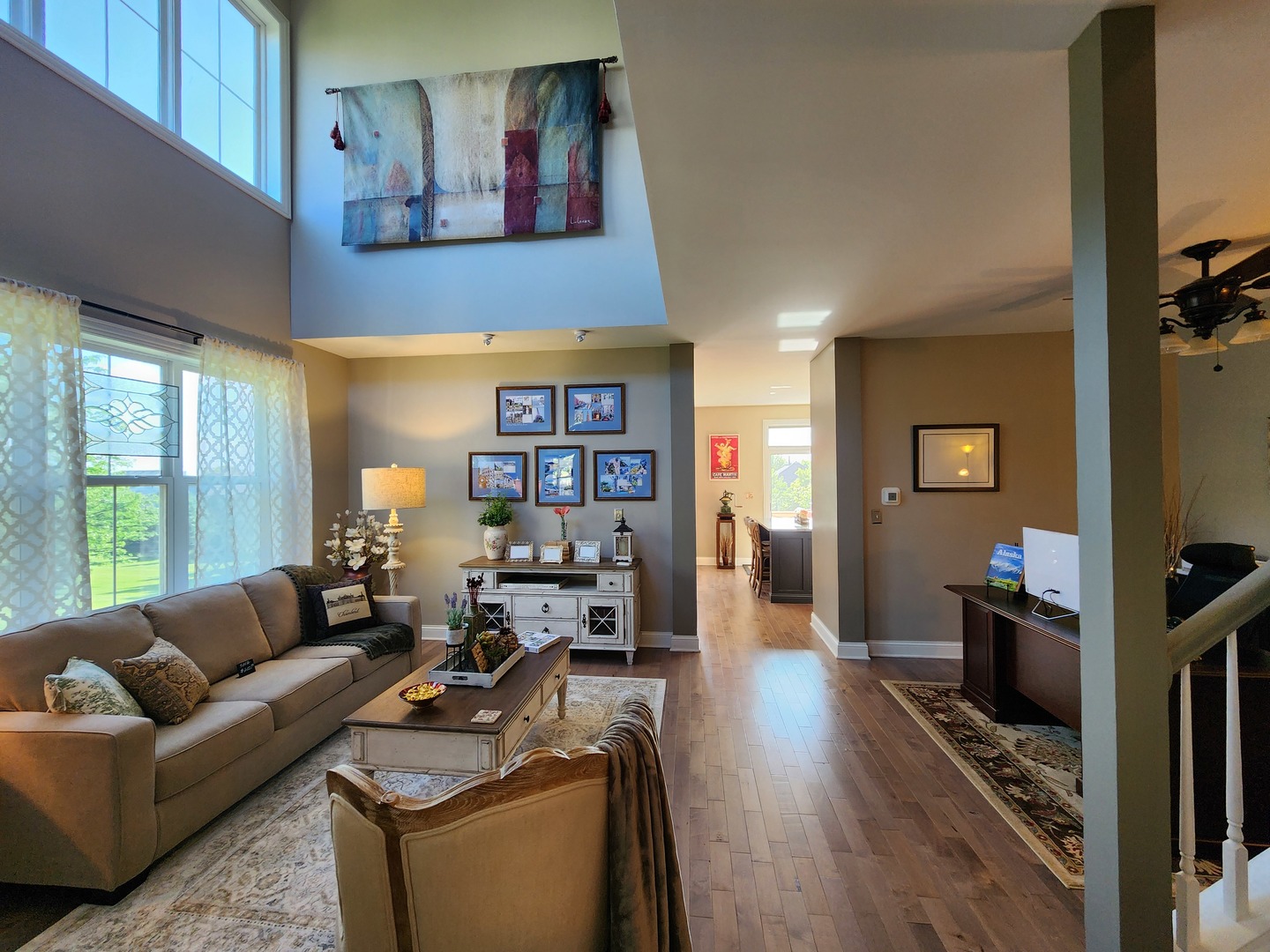 257 Grand Ridge Road, Unit 257 St. Charles, IL 60175 - Photo 11 of 65 a living room with furniture and a flat screen tv