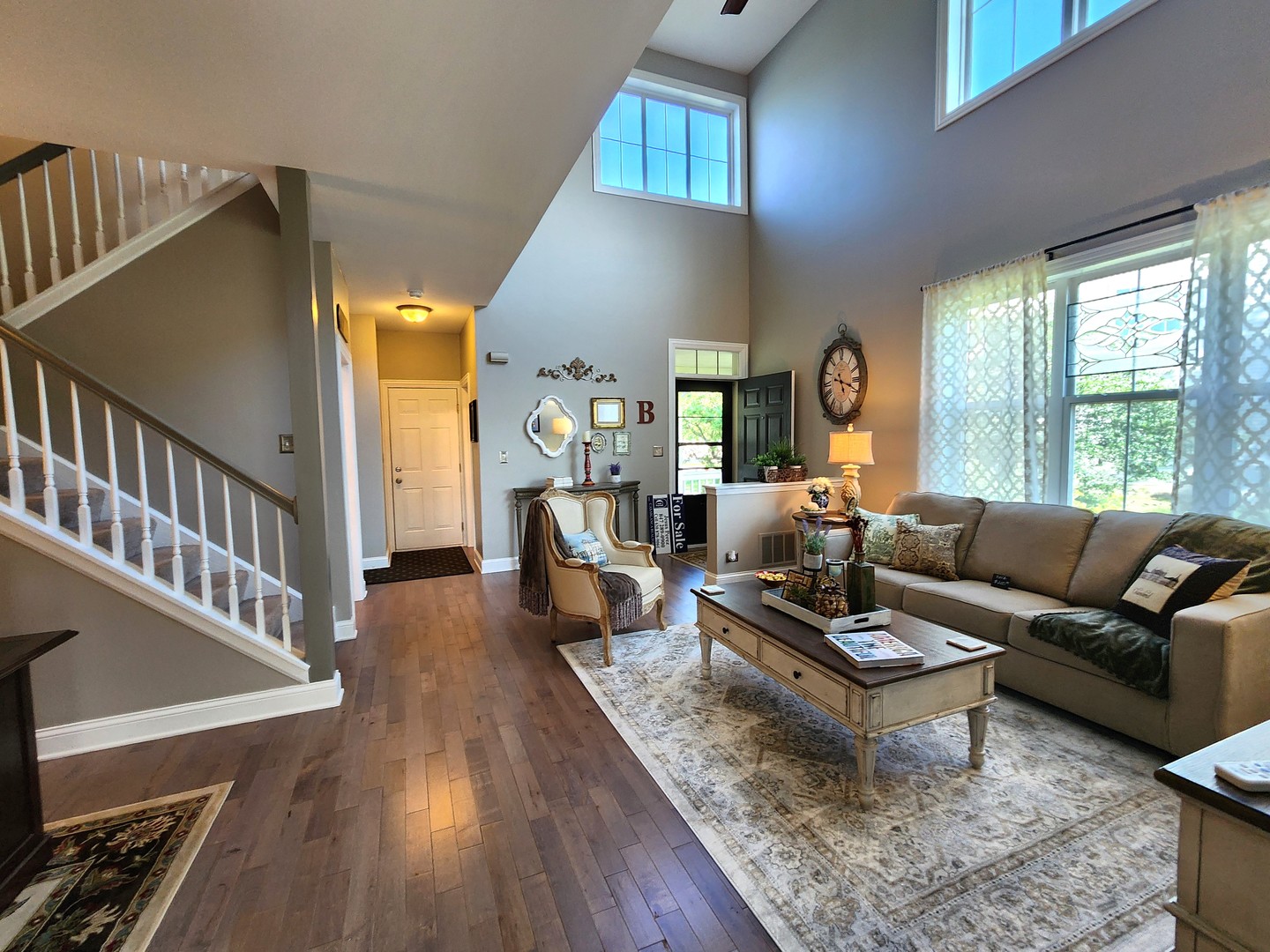 257 Grand Ridge Road, Unit 257 St. Charles, IL 60175 - Photo 19 of 65 a living room with furniture and wooden floor