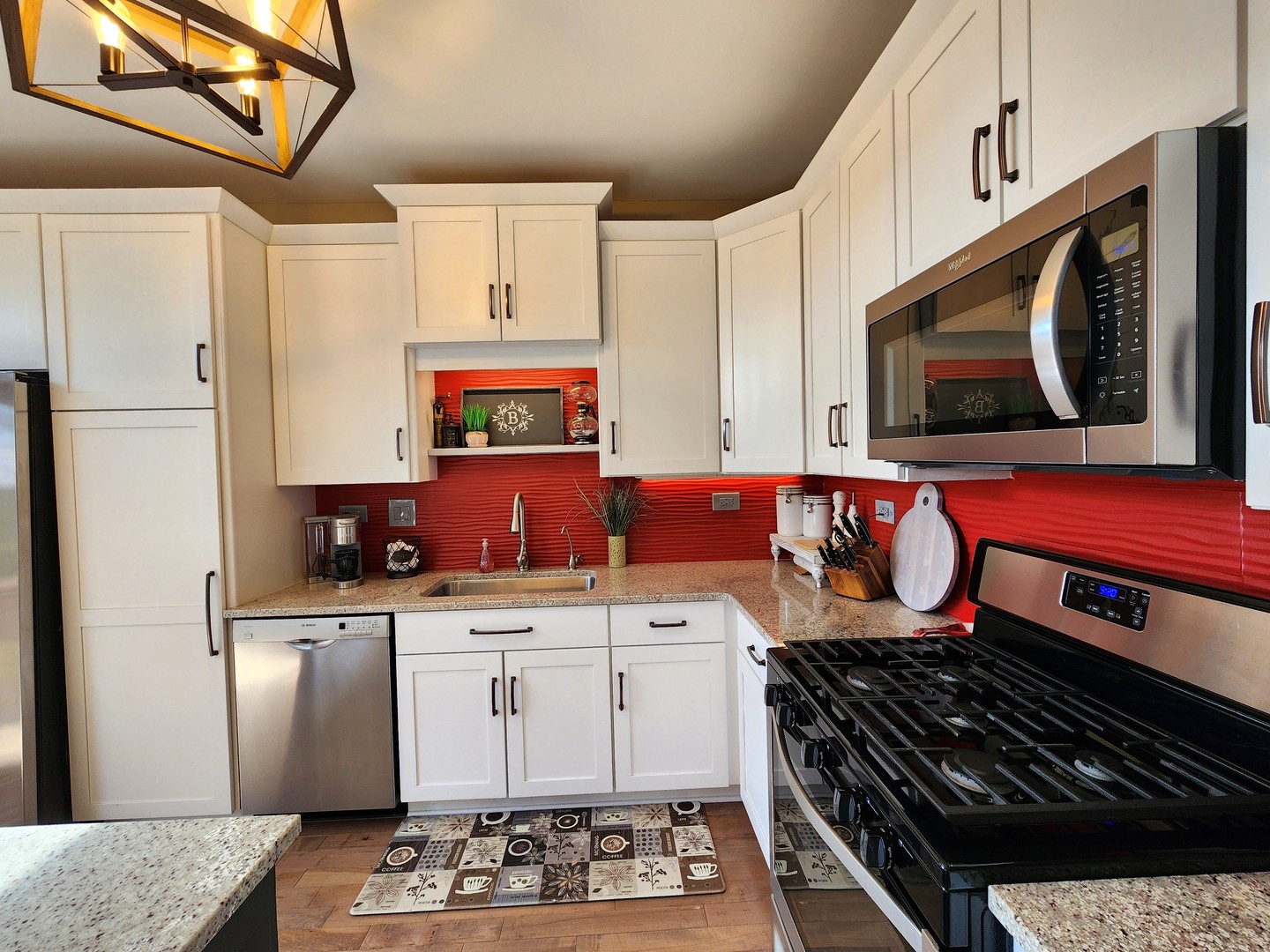 257 Grand Ridge Road, Unit 257 St. Charles, IL 60175 - Photo 24 of 65 a kitchen with stainless steel appliances granite countertop a stove and cabinets