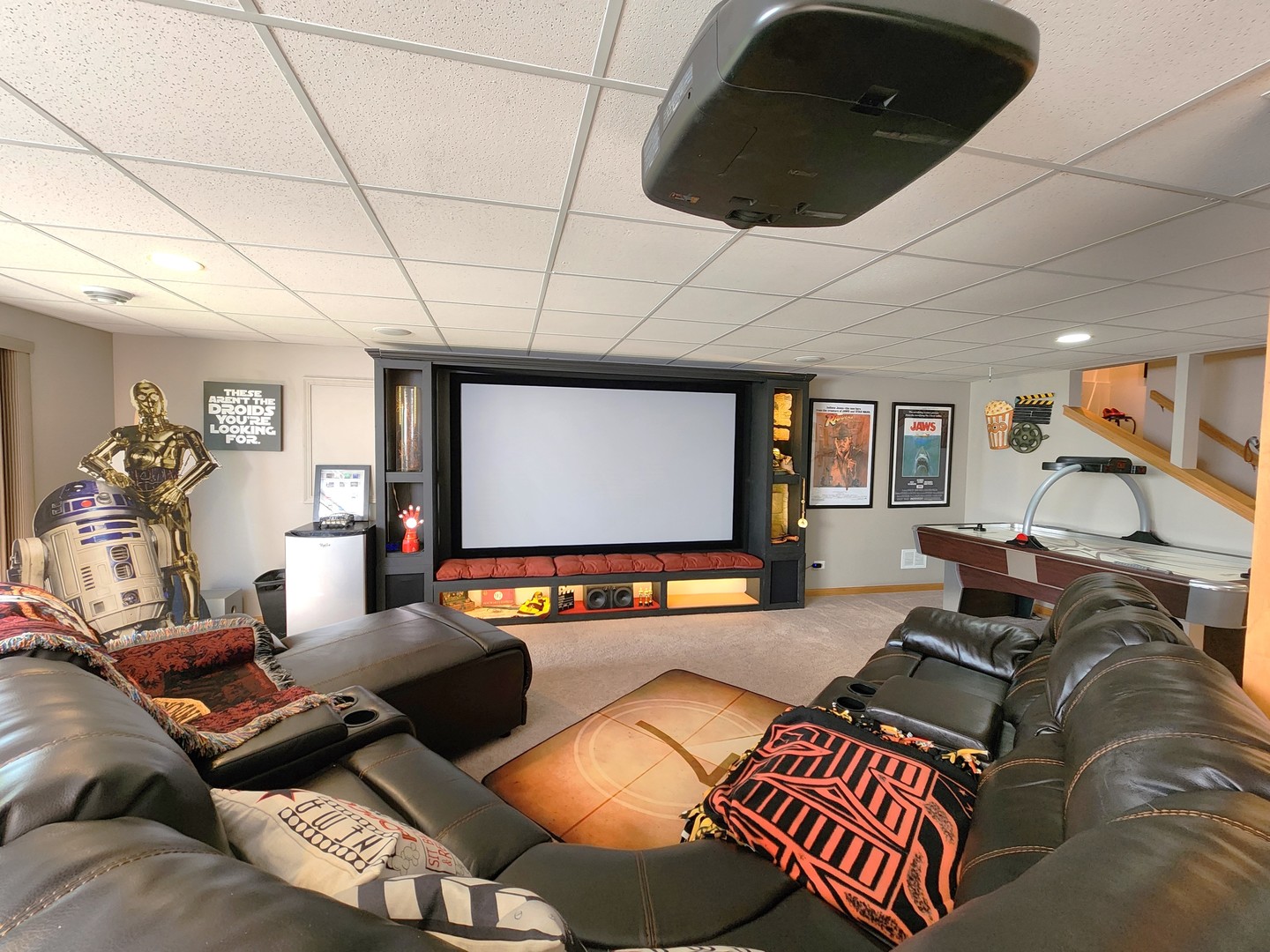 257 Grand Ridge Road, Unit 257 St. Charles, IL 60175 - Photo 51 of 65 a living room with furniture and a flat screen tv