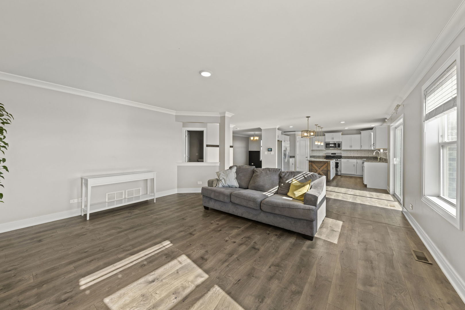 934 Redcliff Road New Lenox, IL 60451 - Photo 12 of 34 a living room with furniture and a wooden floor