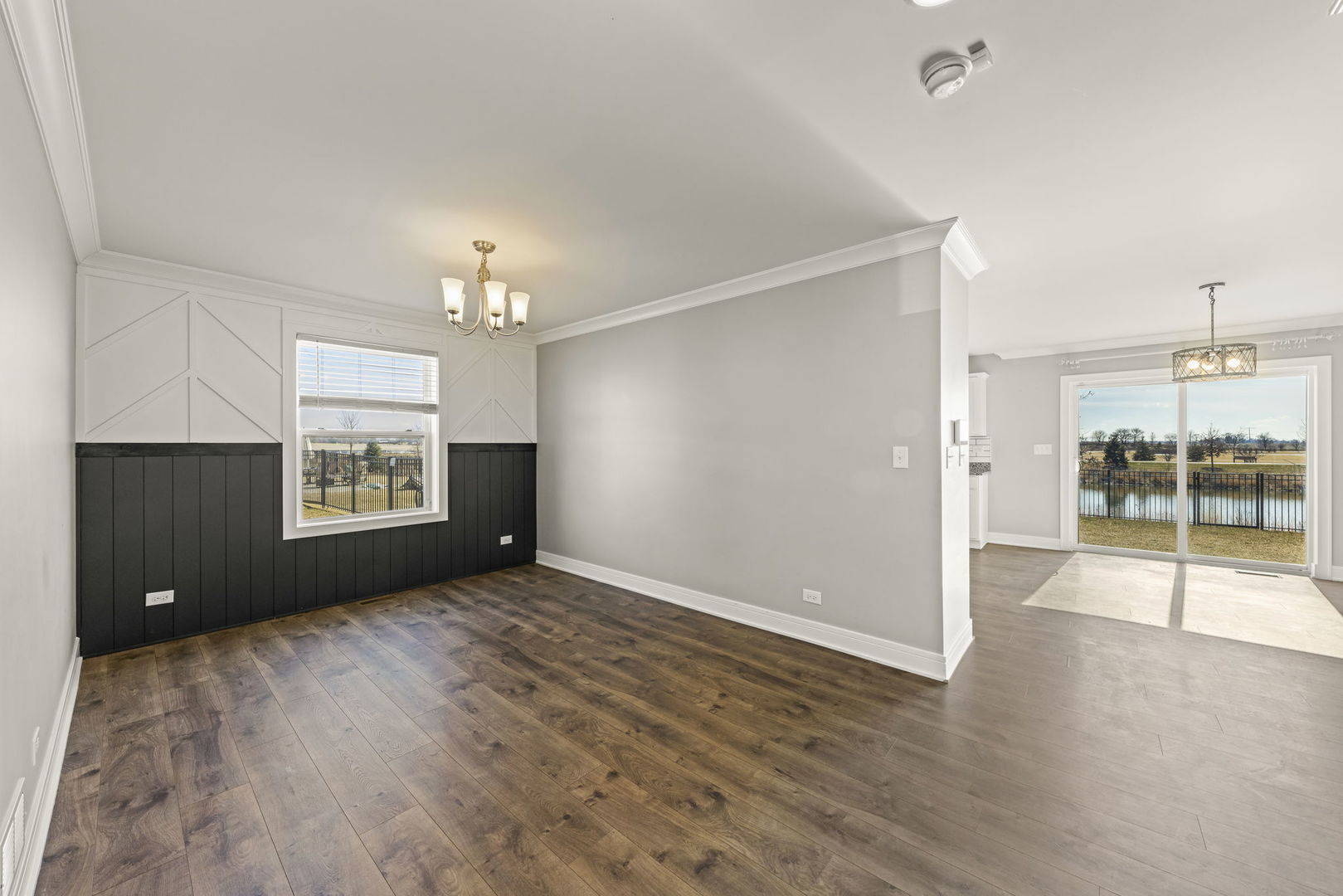 934 Redcliff Road New Lenox, IL 60451 - Photo 5 of 34 an empty room with wooden floor and windows