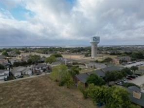 7410 Miller Road Rowlett, TX 75088 - Photo 5 of 5 an aerial view of a city with lots of residential buildings