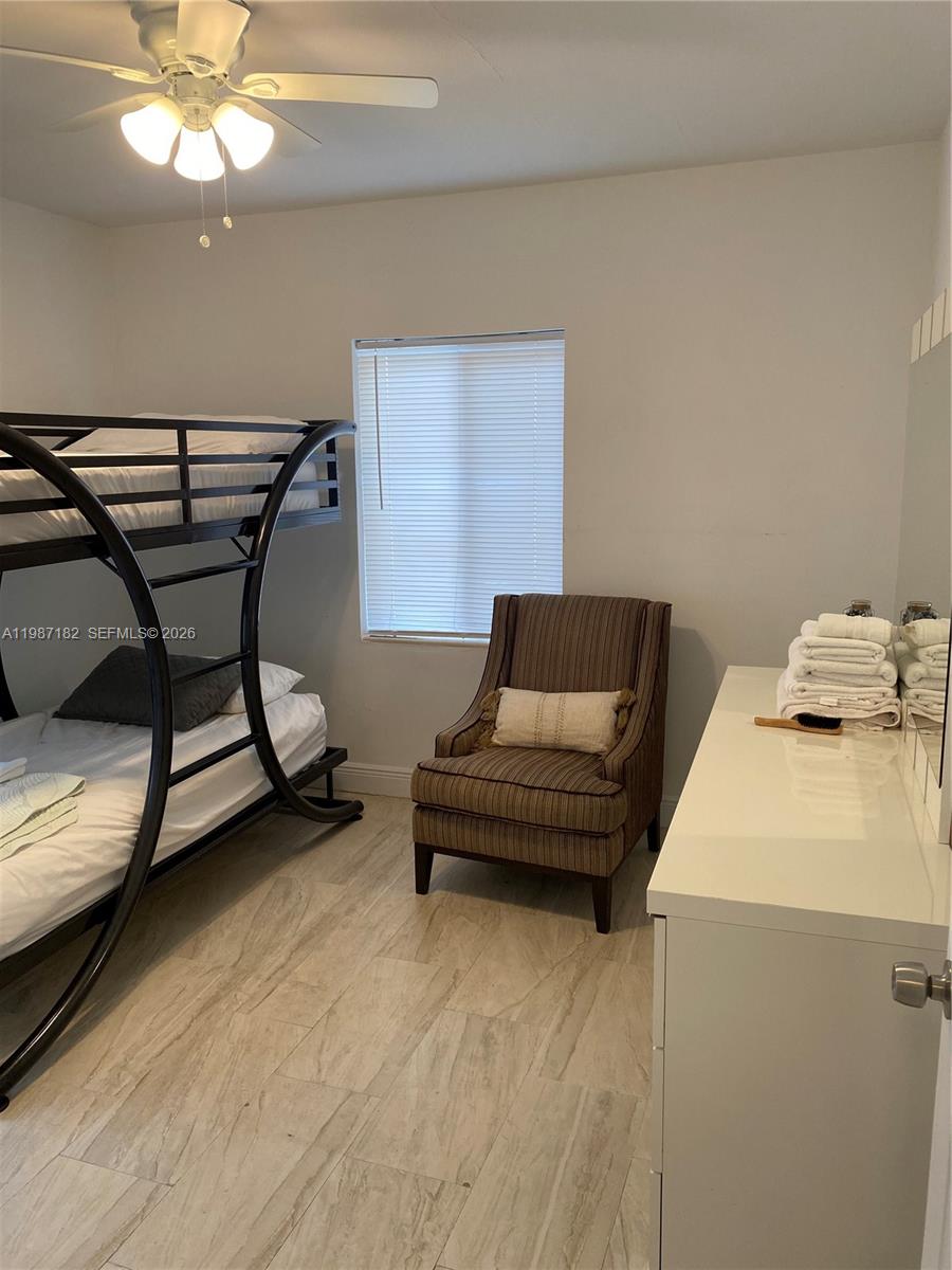 2 Northeast 45th Street Miami, FL 33137 - Photo 13 of 27 a living room with furniture and a wooden floor