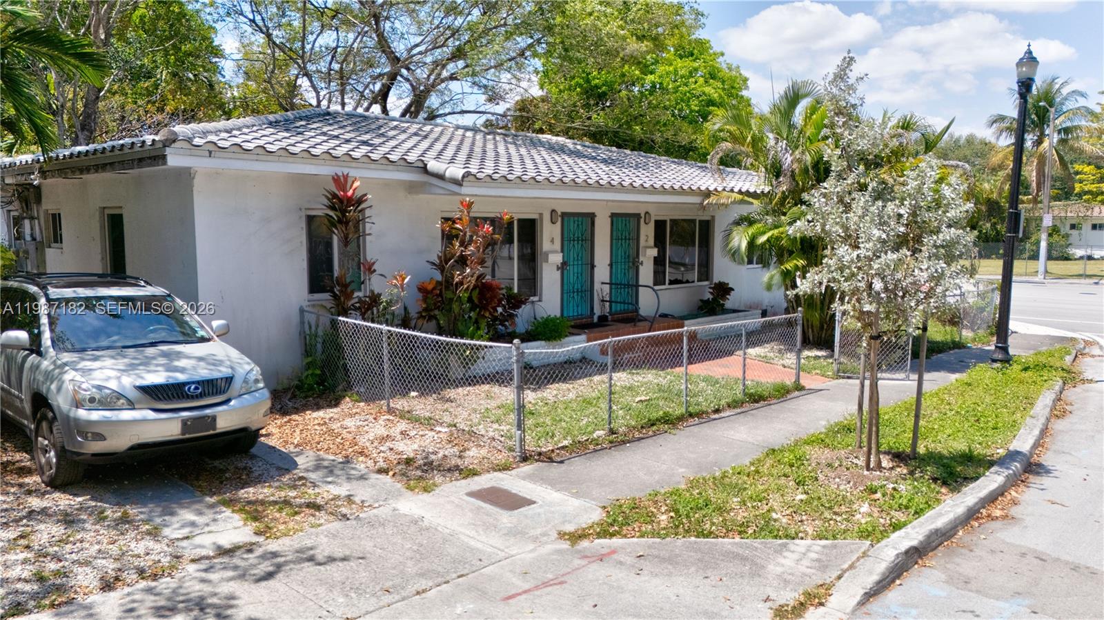 2 Northeast 45th Street Miami, FL 33137 - Photo 4 of 27 a view of a house with a yard siting area and garden