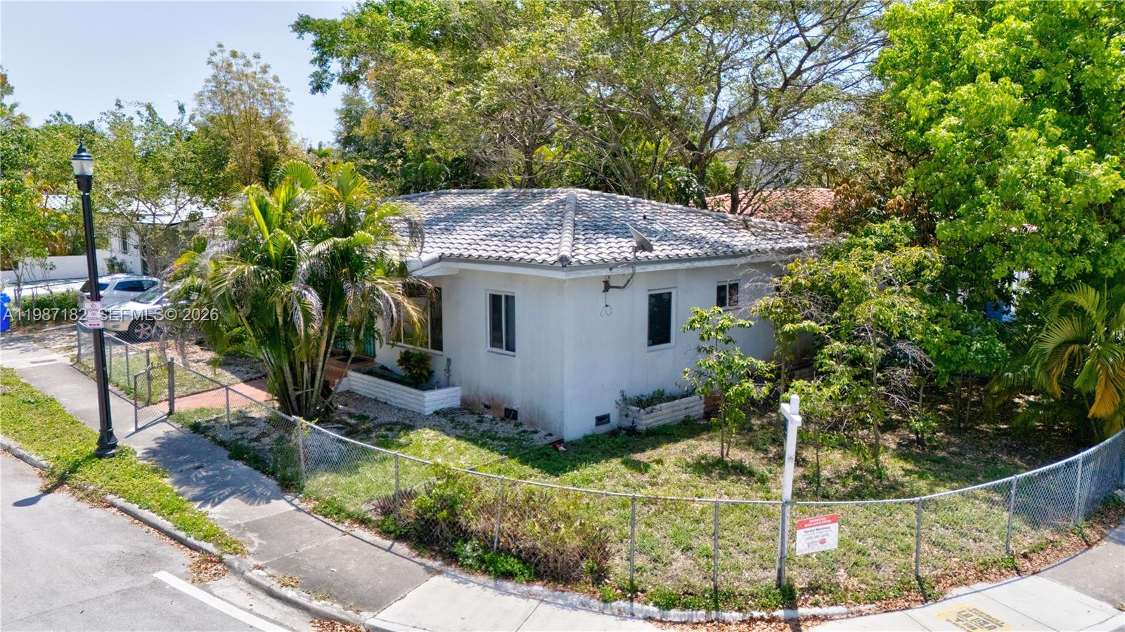 2 Northeast 45th Street Miami, FL 33137 - Photo 7 of 27 a view of a backyard with small cabin