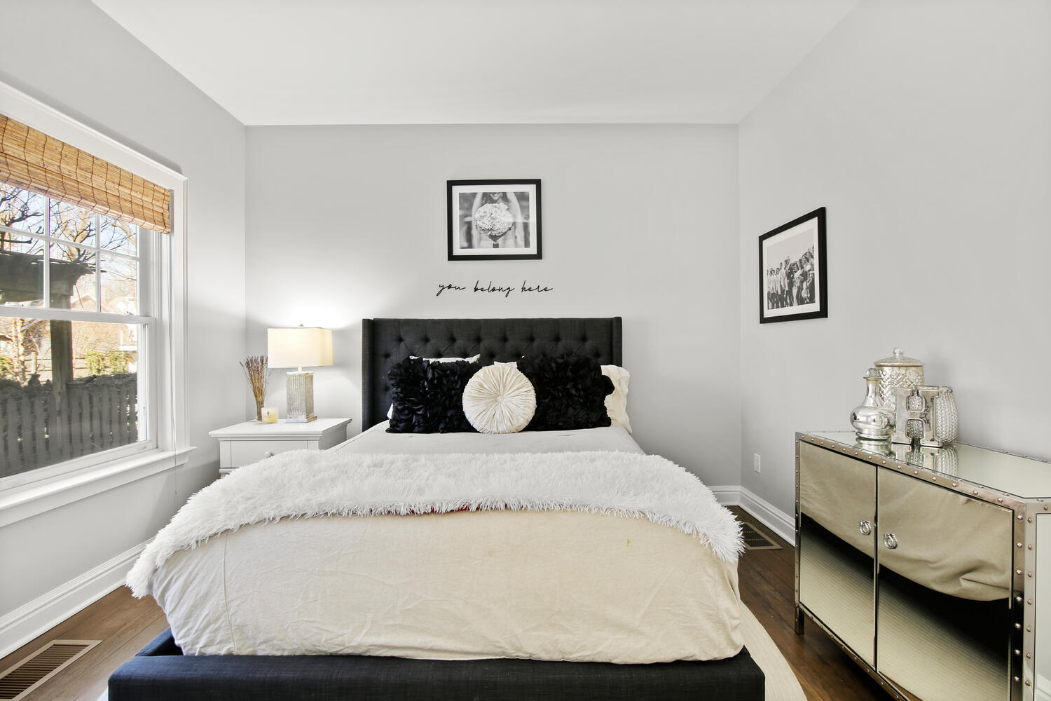 12 Pond Ridge Lane Rowayton, CT 06853 - Photo 16 of 35 a bed sitting in a bedroom next to a window