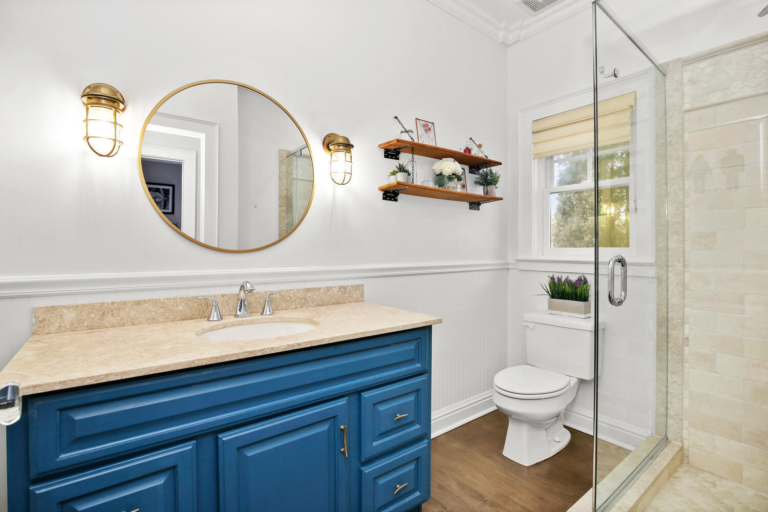 12 Pond Ridge Lane Rowayton, CT 06853 - Photo 17 of 35 a bathroom with a toilet sink and mirror