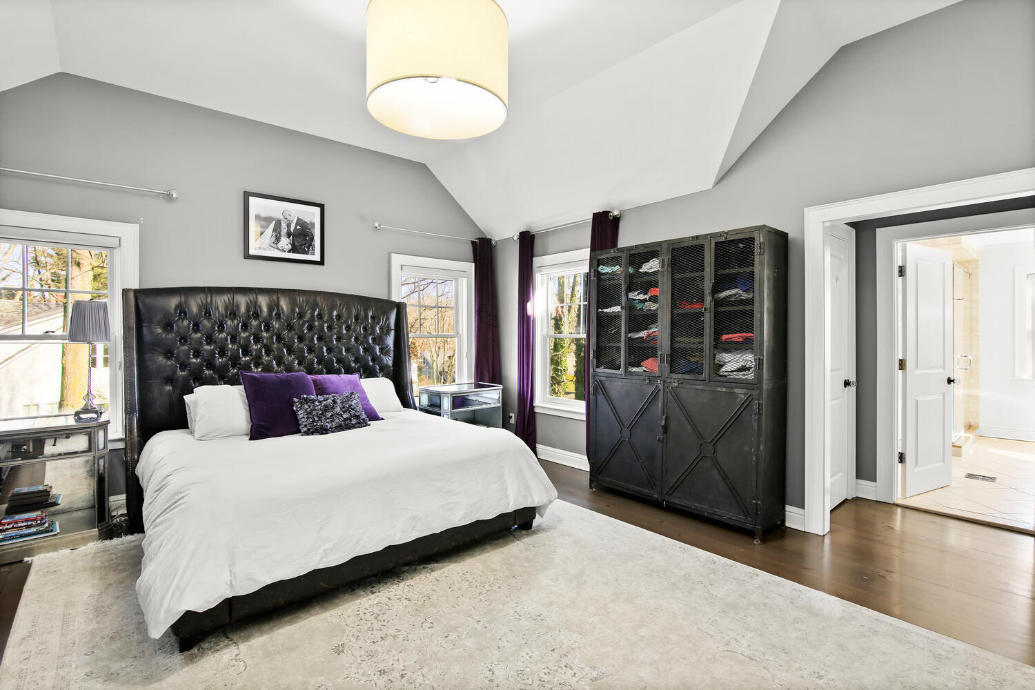 12 Pond Ridge Lane Rowayton, CT 06853 - Photo 19 of 35 a bedroom with a large bed and a couch