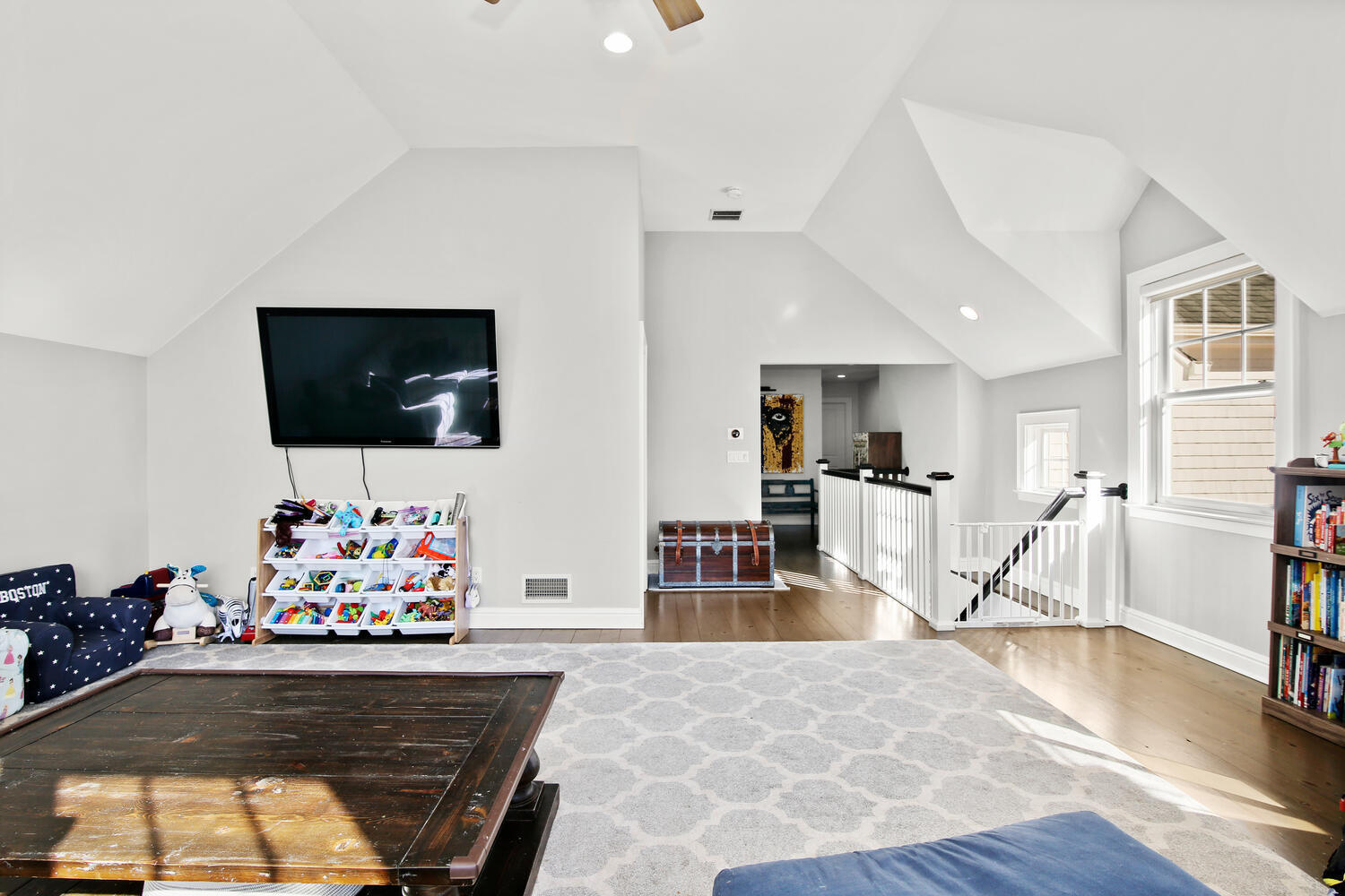 12 Pond Ridge Lane Rowayton, CT 06853 - Photo 25 of 35 a living room with furniture and a flat screen tv