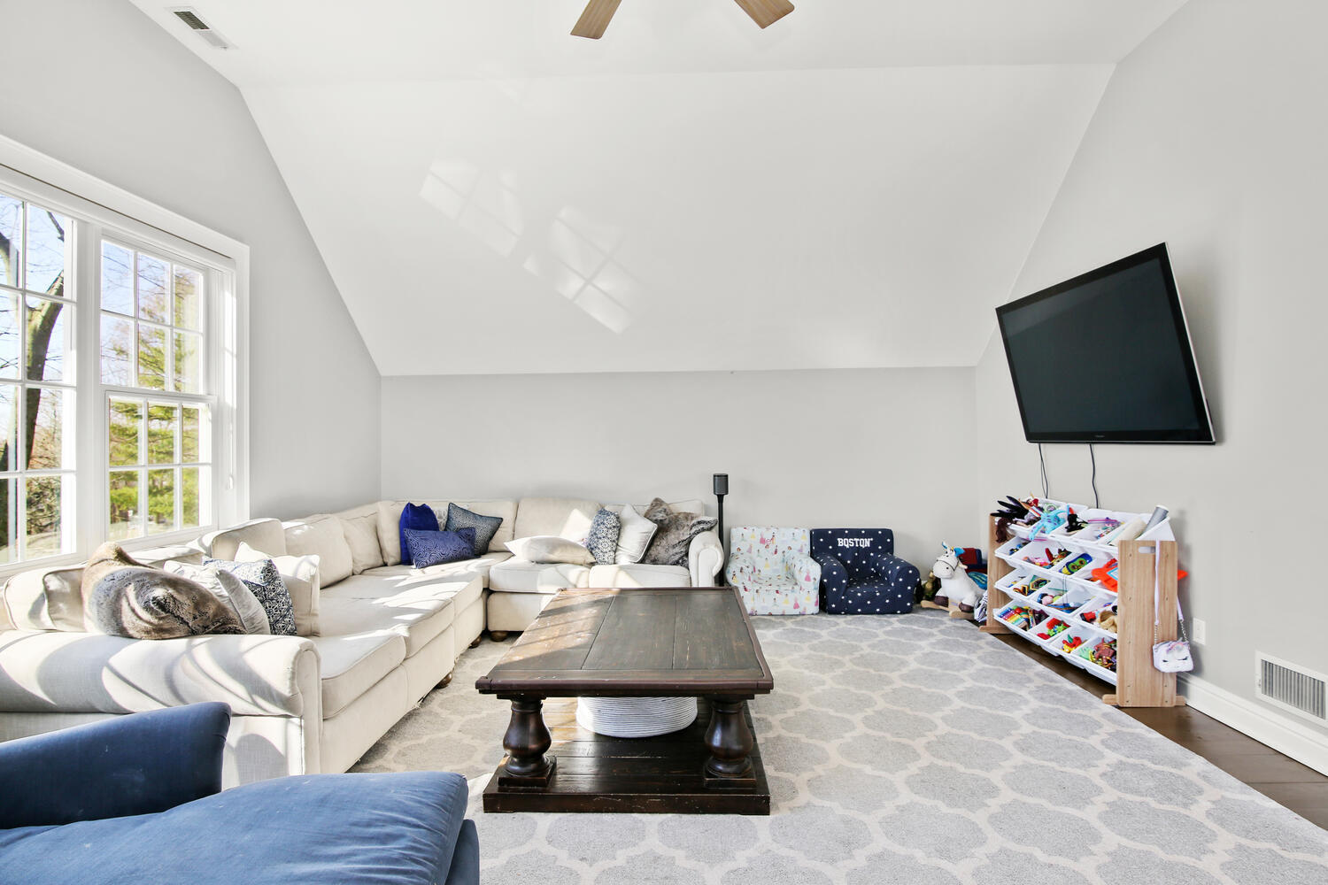 12 Pond Ridge Lane Rowayton, CT 06853 - Photo 26 of 35 a living room with furniture and a flat screen tv