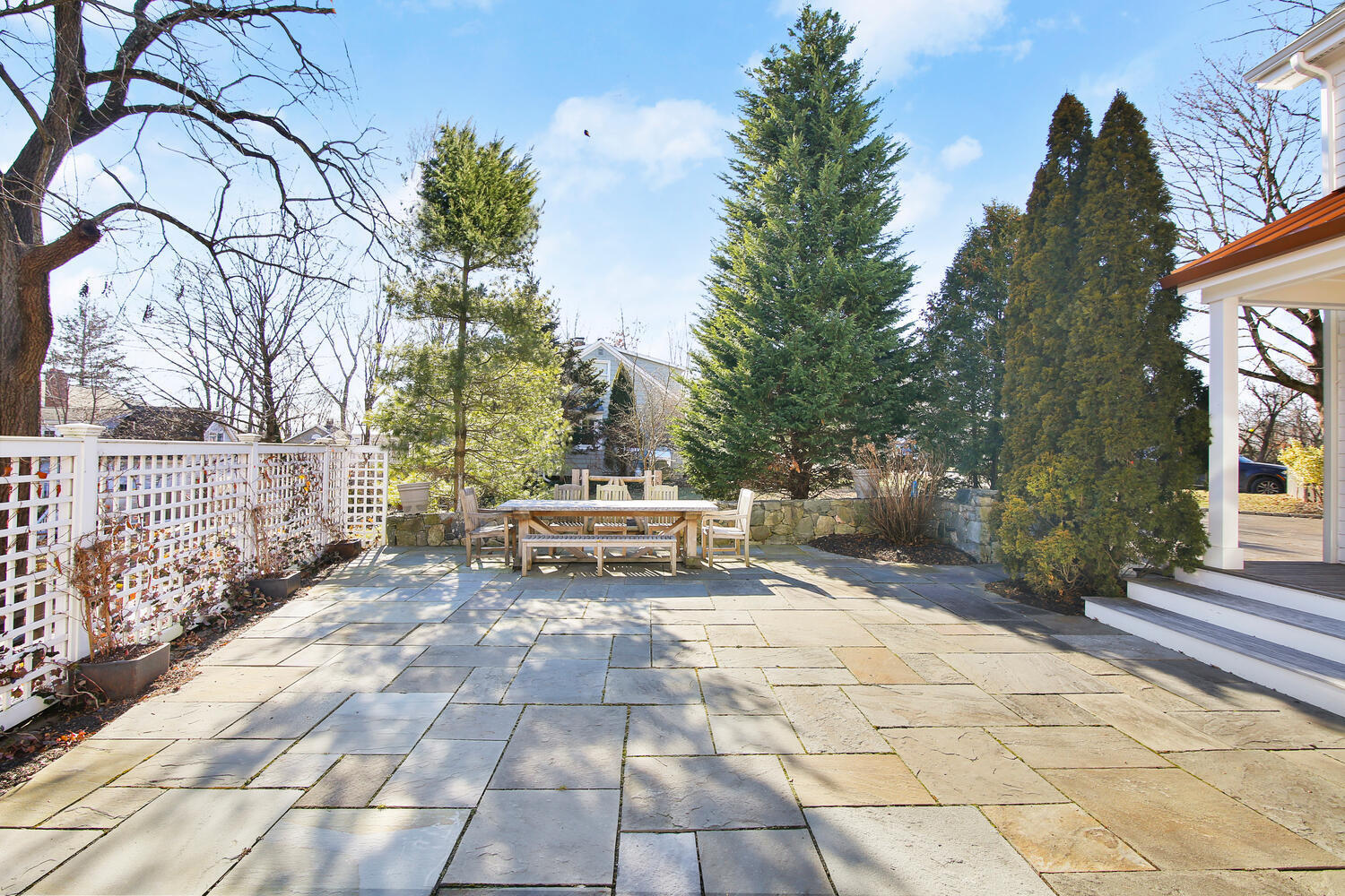 12 Pond Ridge Lane Rowayton, CT 06853 - Photo 31 of 35 a view of a bench in a patio