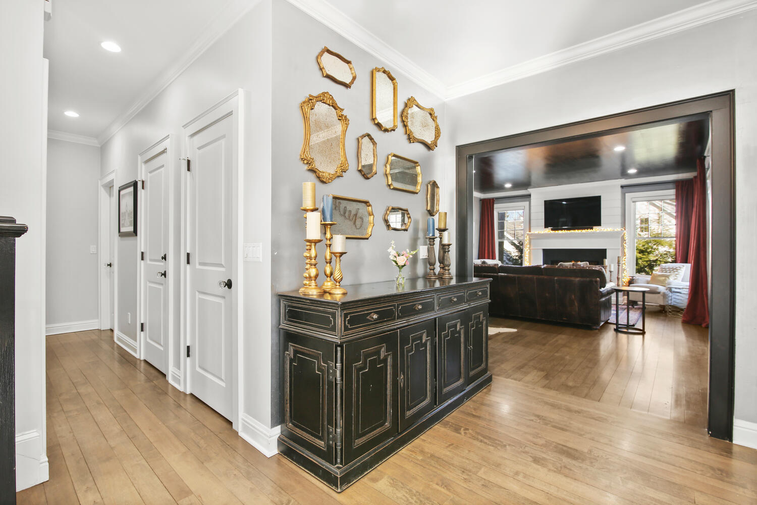 12 Pond Ridge Lane Rowayton, CT 06853 - Photo 6 of 35 a view of a hallway with wooden floor and windows