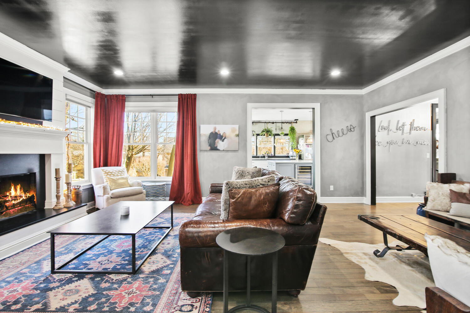 12 Pond Ridge Lane Rowayton, CT 06853 - Photo 9 of 35 a living room with furniture a flat screen tv and a fireplace