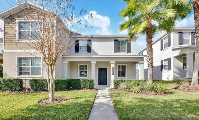 front view of a house with a yard