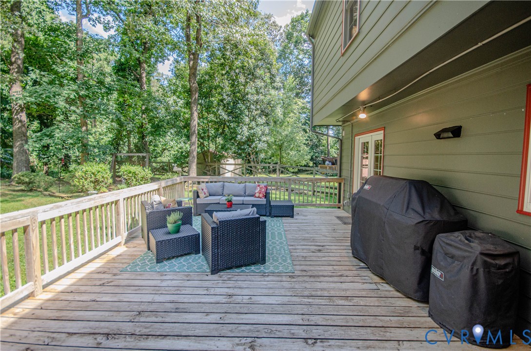 12500 Musical Lane Midlothian, VA 23113 - Photo 50 of 51 Expansive wooden deck with white railing, featurin