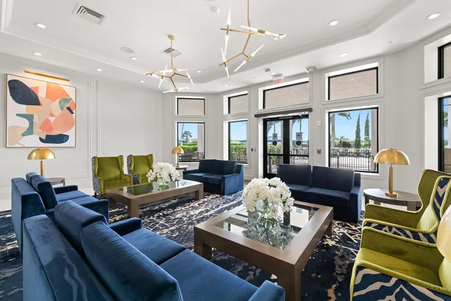 a very nice looking dining room with furniture