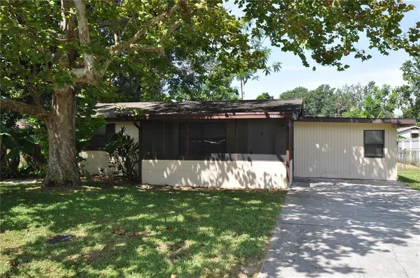 a view of a back yard of the house