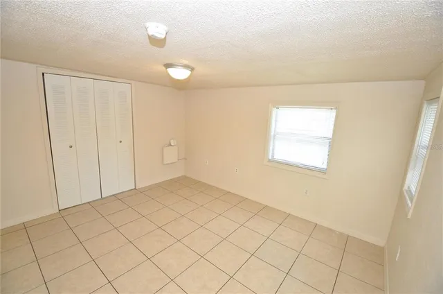 a bathroom with a sink a toilet and bathtub