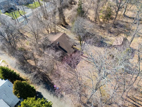 a view of a backyard of the house