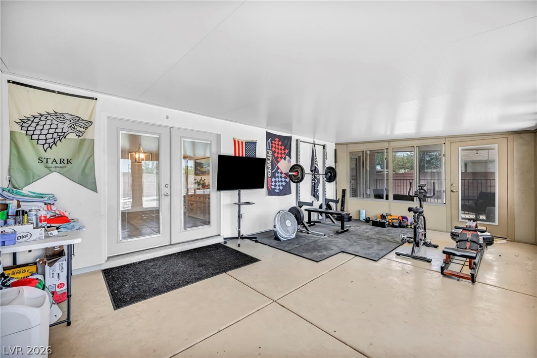 1234 Sunfire Street Henderson, NV 89014 - Photo 24 of 40 An adaptable enclosed patio provides a dedicated space for fitness and leisure activities.