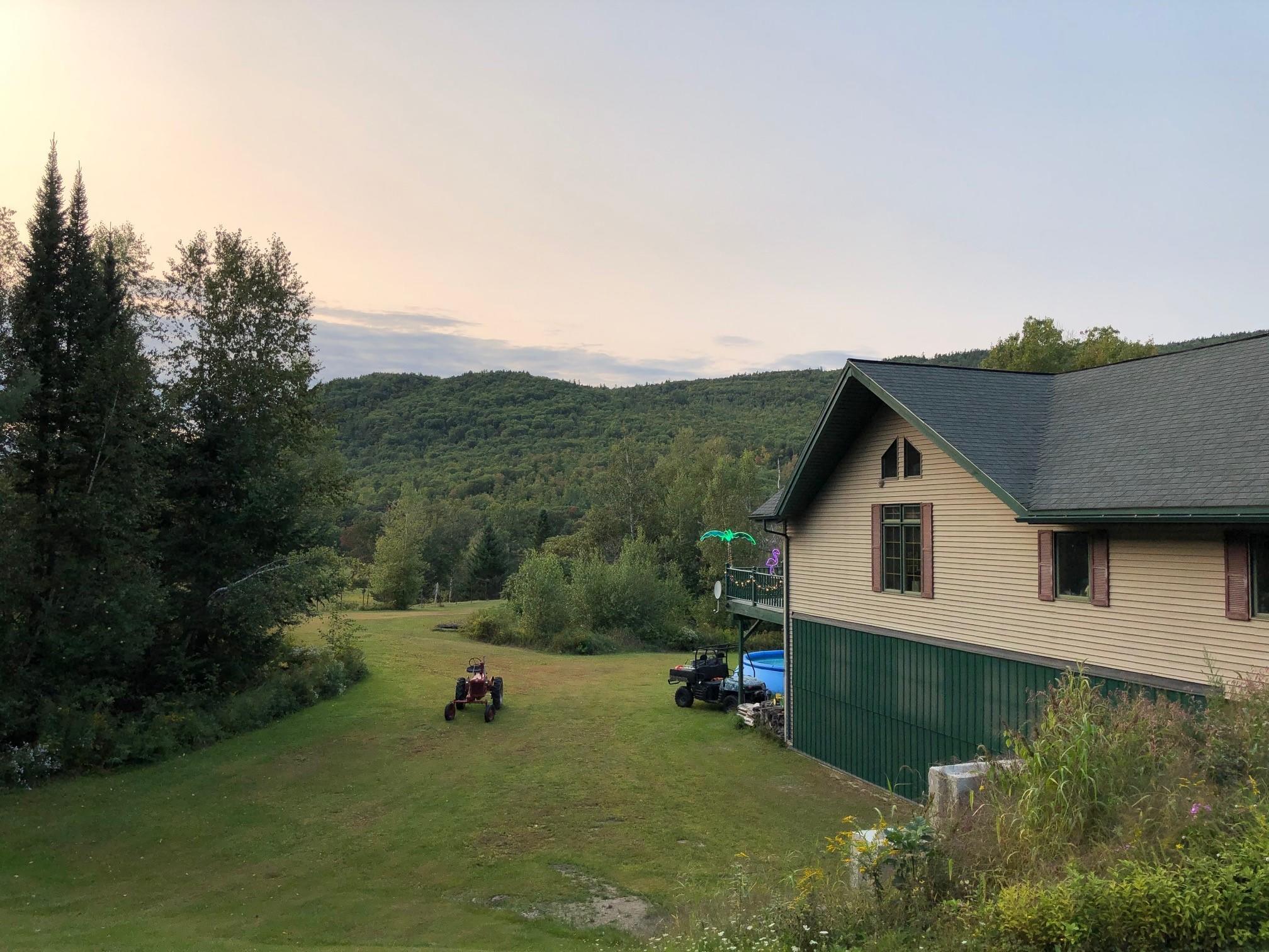462 South Rumford Road Rumford, ME 04276 - Photo 60 of 68 Side view of house with mountains
